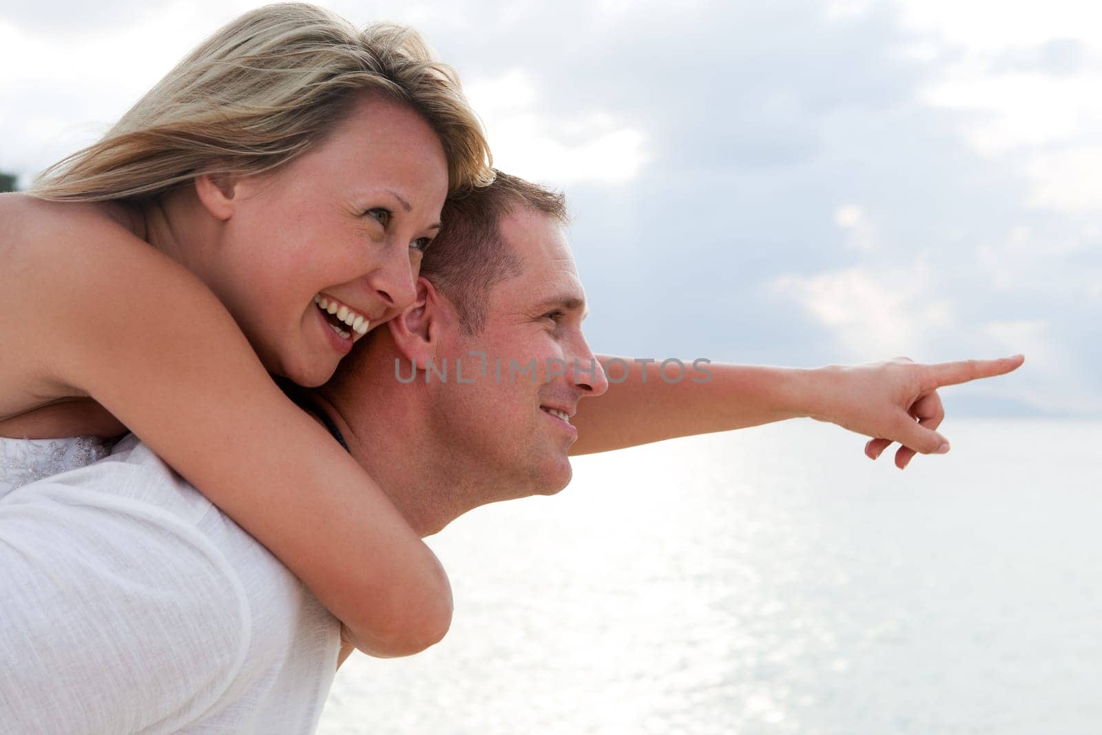 Happy people,couple in love on vacation at the beach