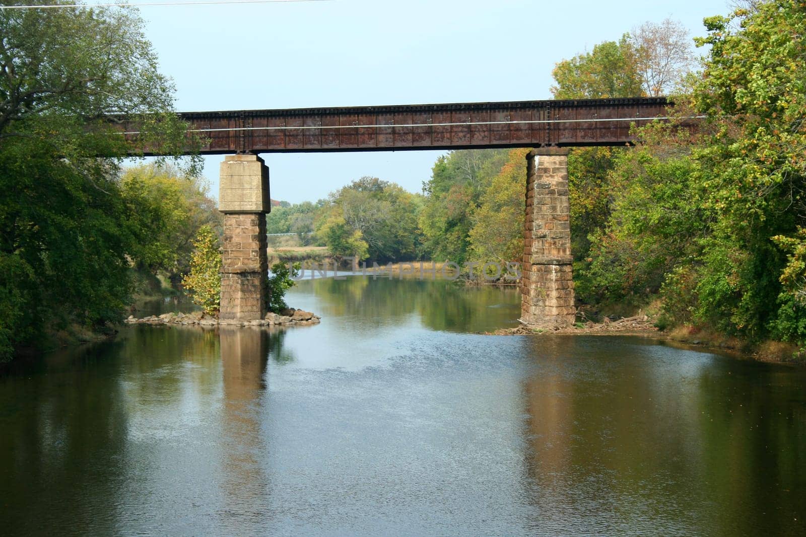 A Train Tressel over a river with support columns