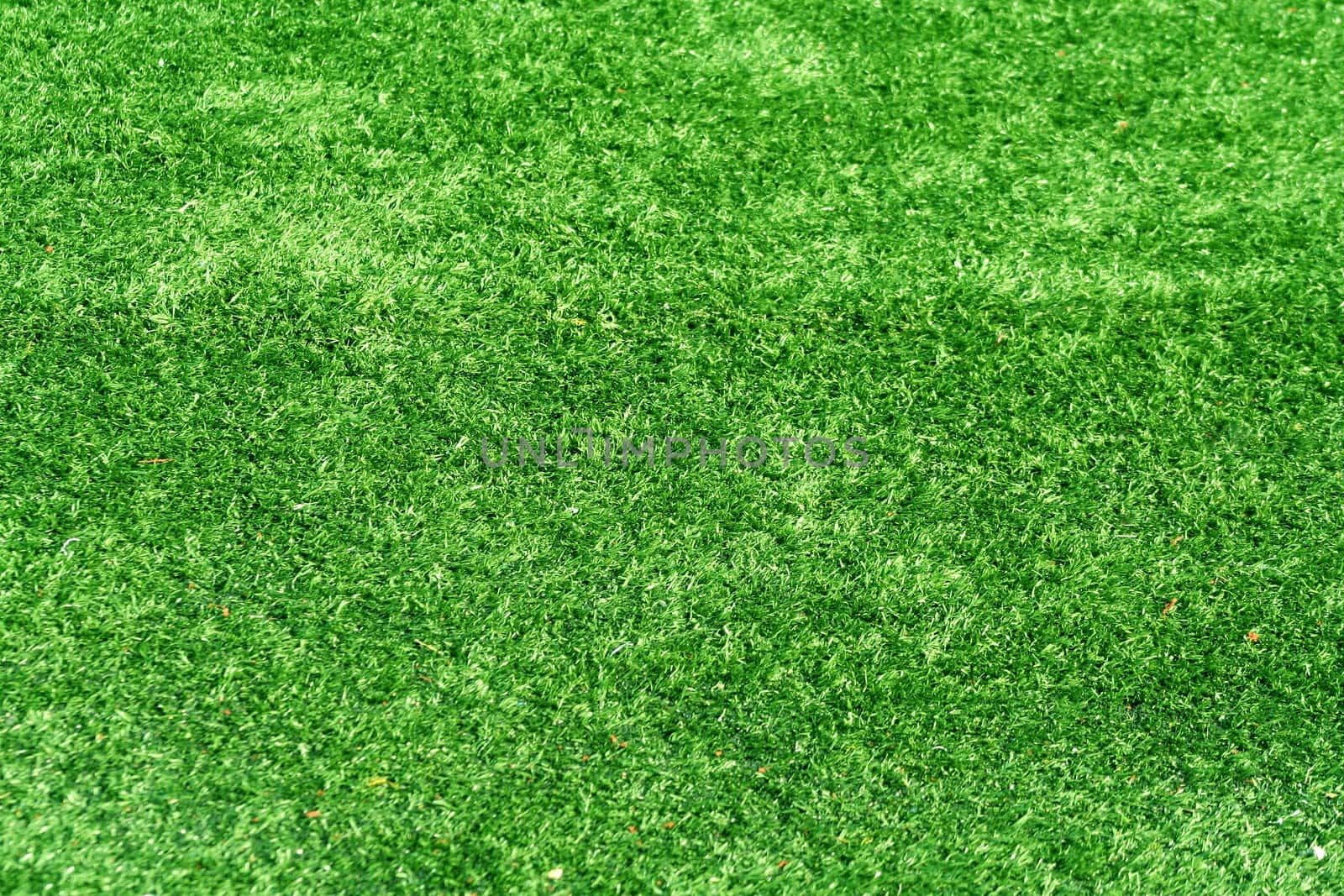 A green Astro turf background