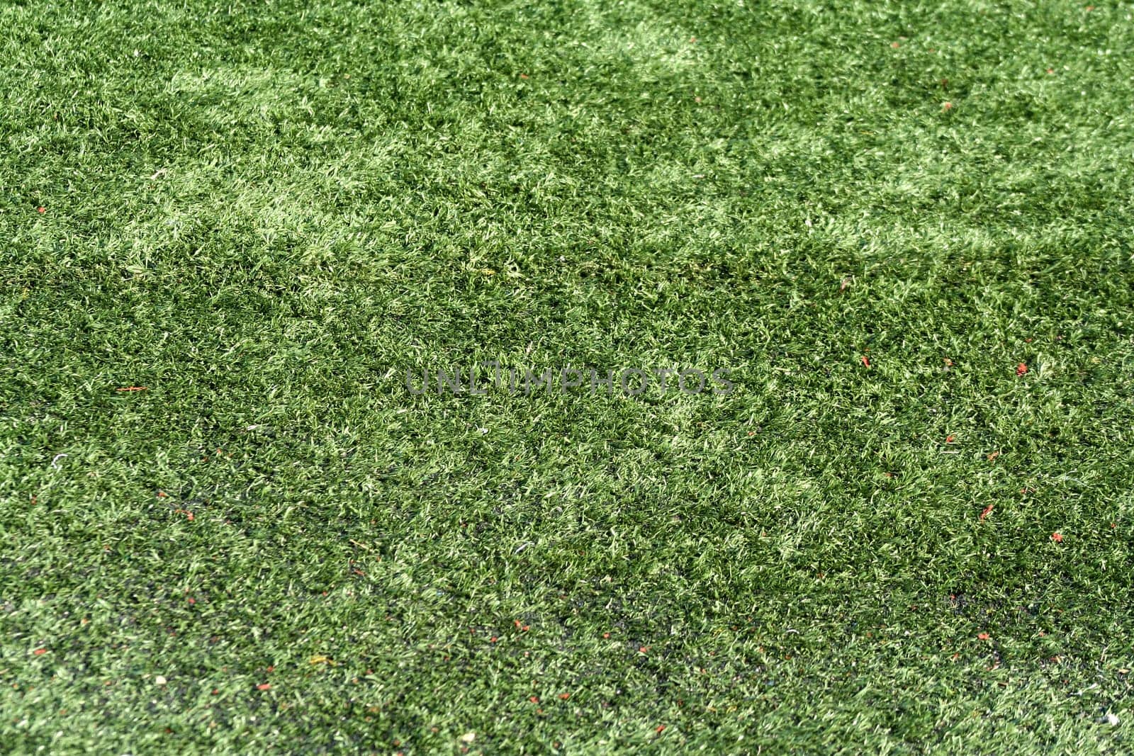 A green Astro turf background