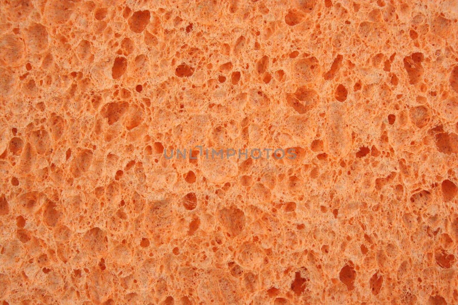 Orange sponge textured background