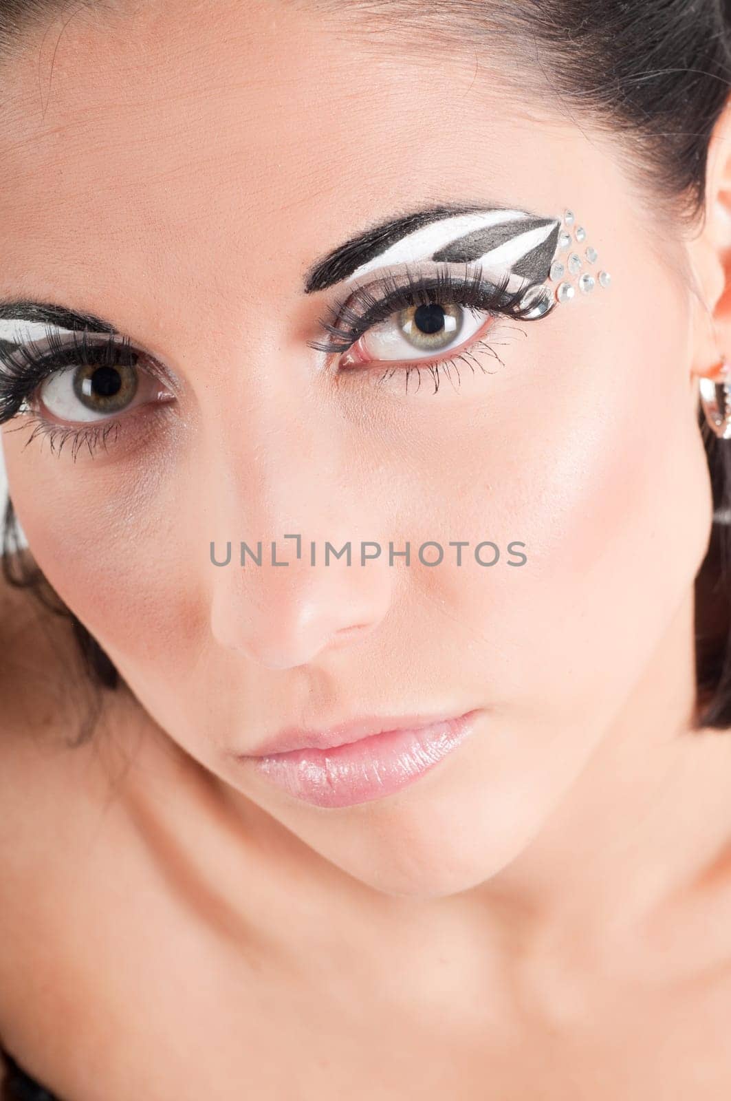 Closeup fashion woman with color face art