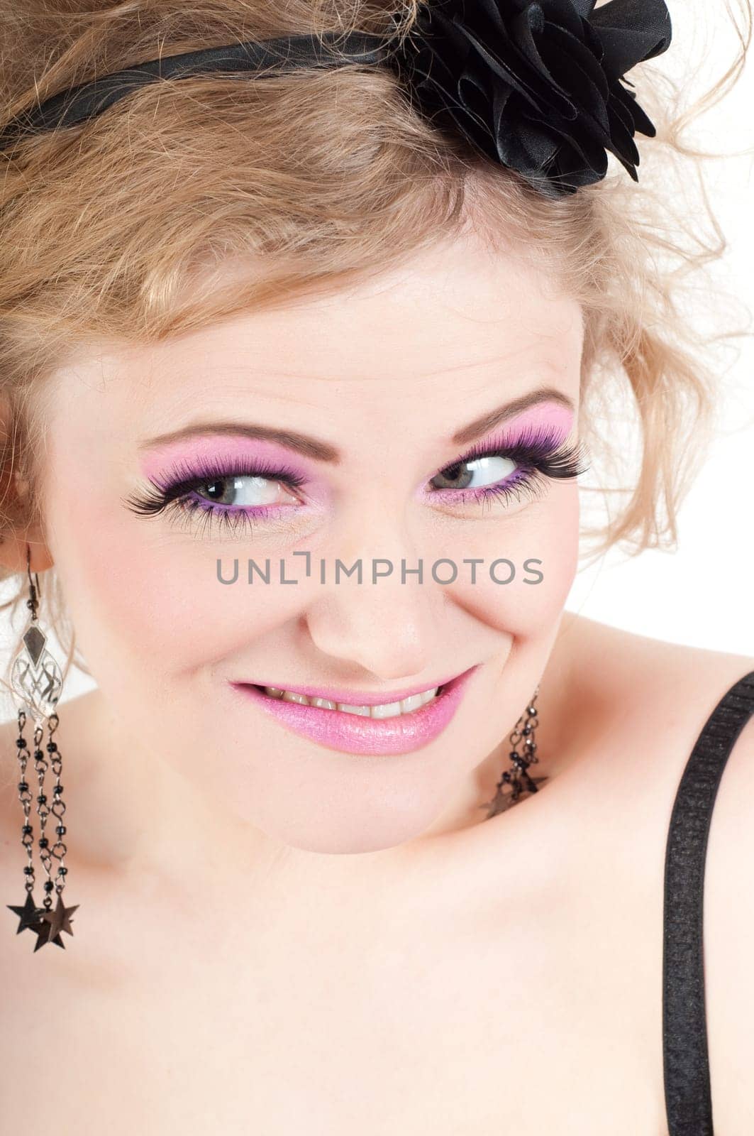Portrait of young beautiful sexy tender blonde with fancy make-up
