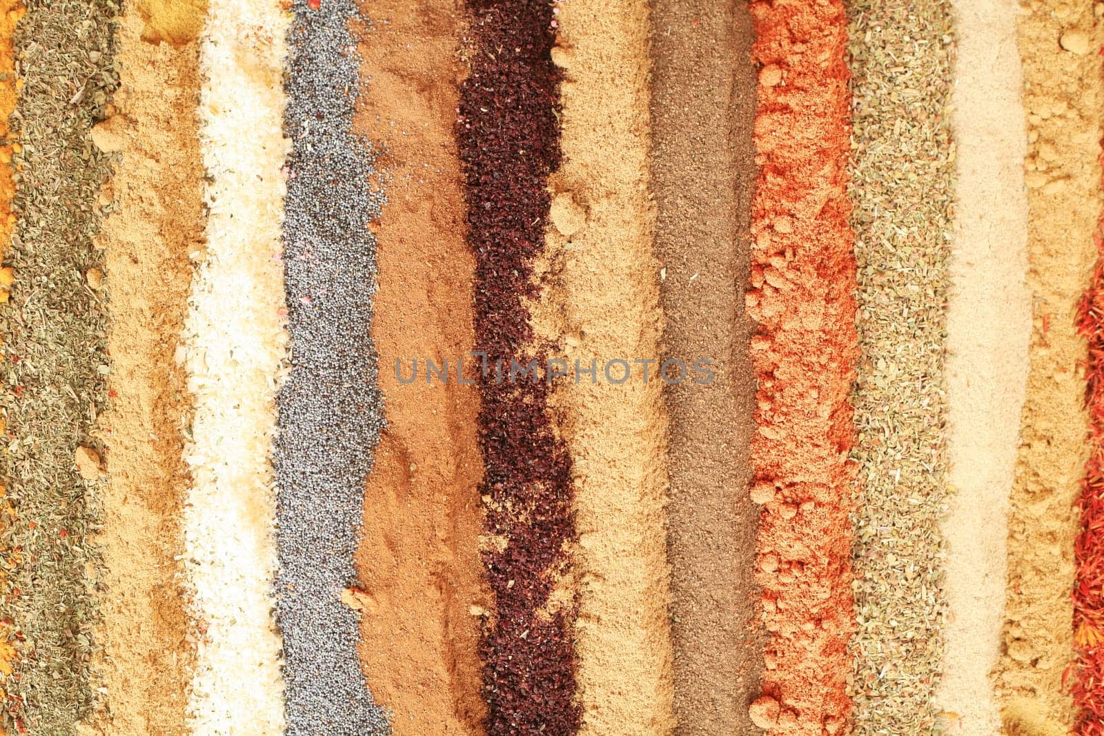 multi colored background of different oriental spices