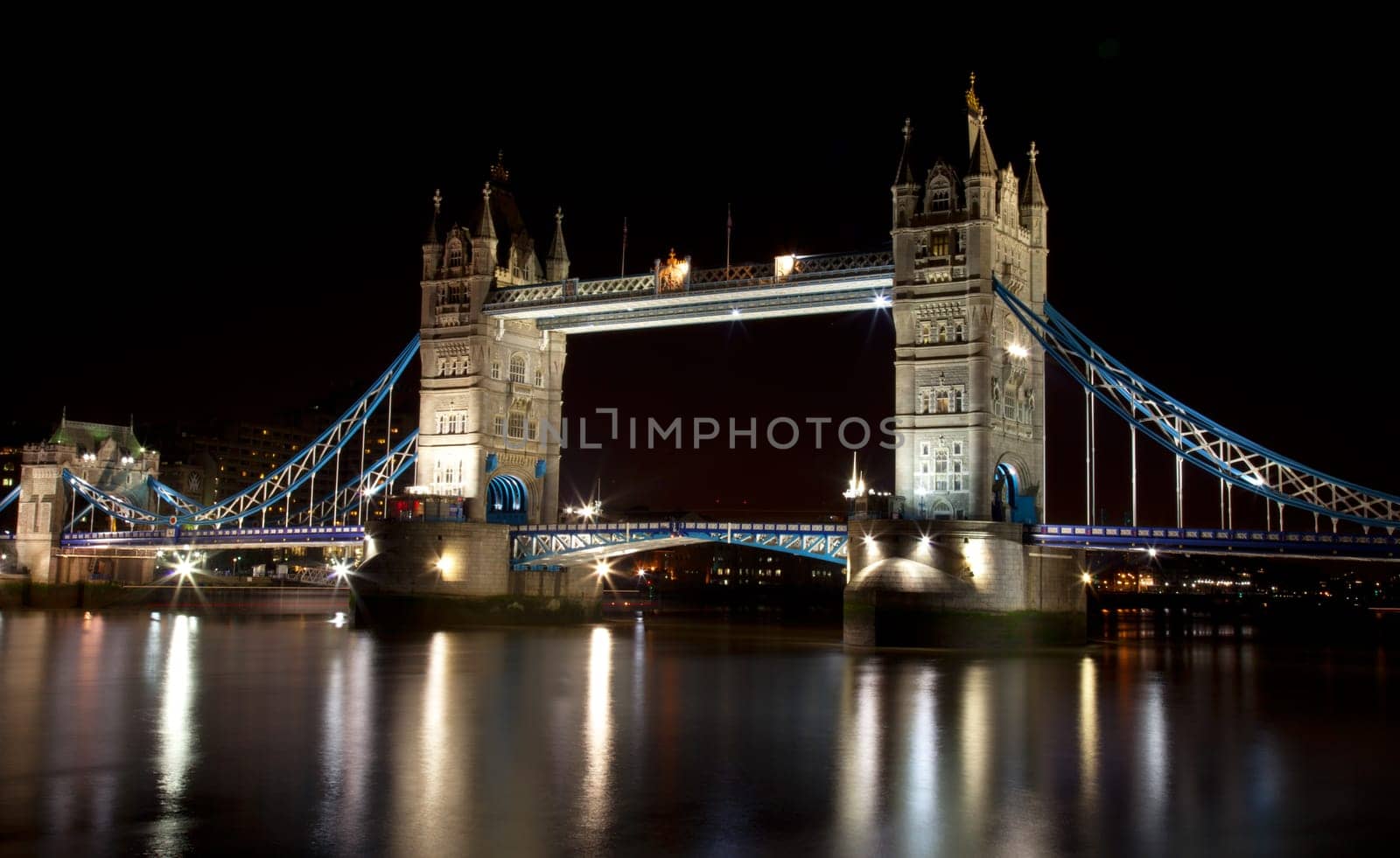 London Tower Bridge at night with plenty of lights