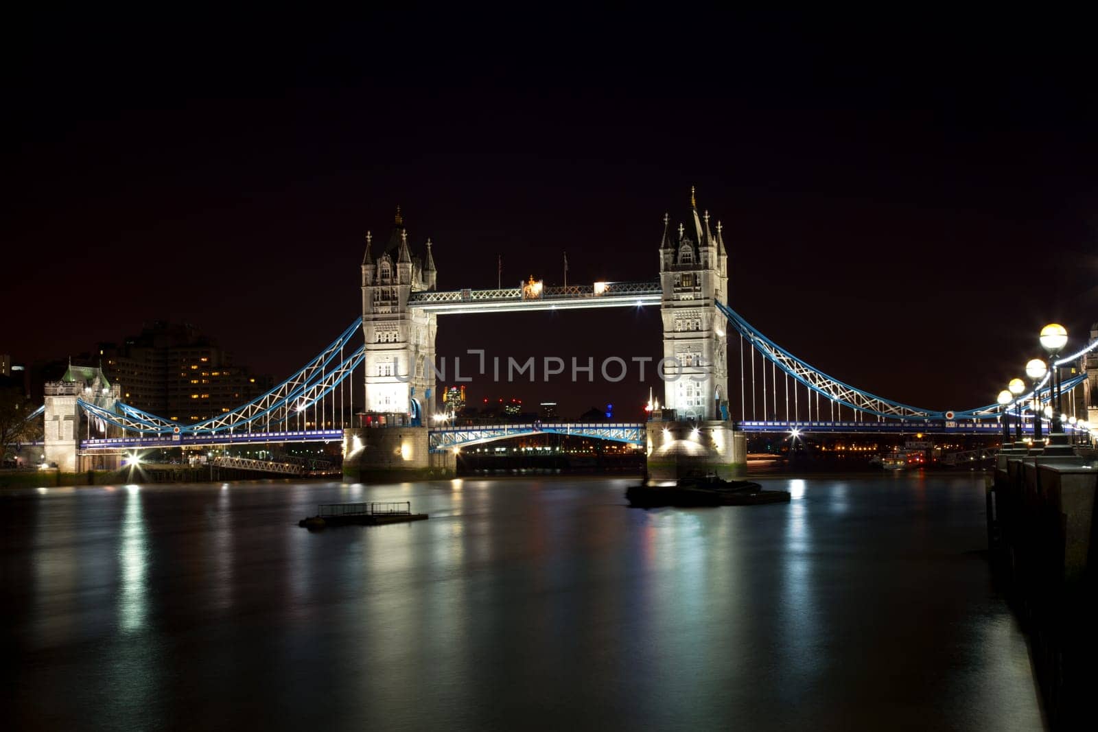 London Tower Bridge at night with plenty of lights