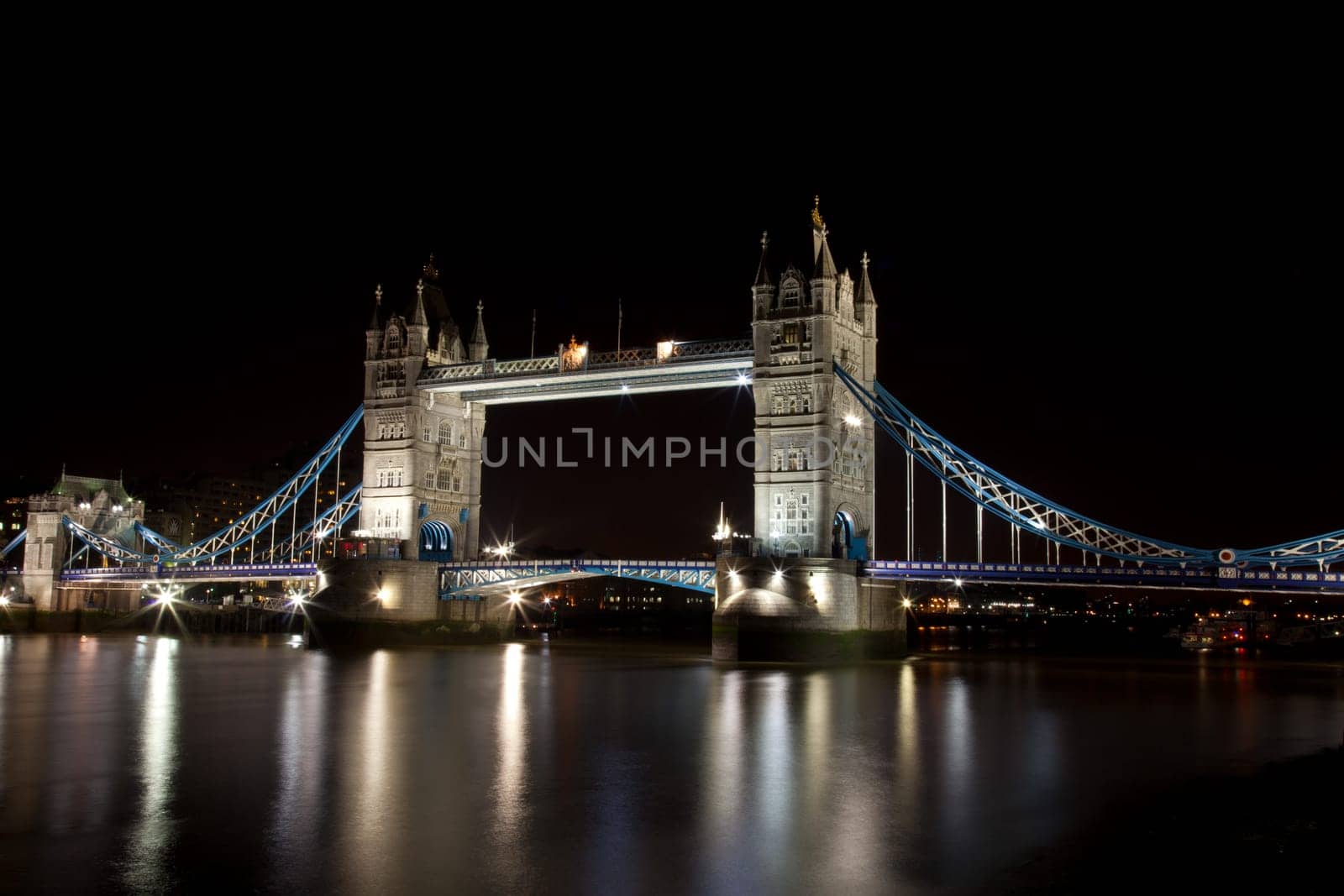 London Tower Bridge at night with plenty of lights