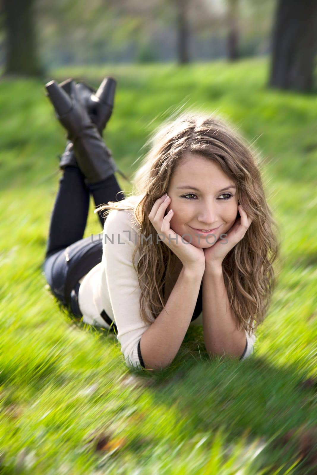 Young woman on a sunny day in park