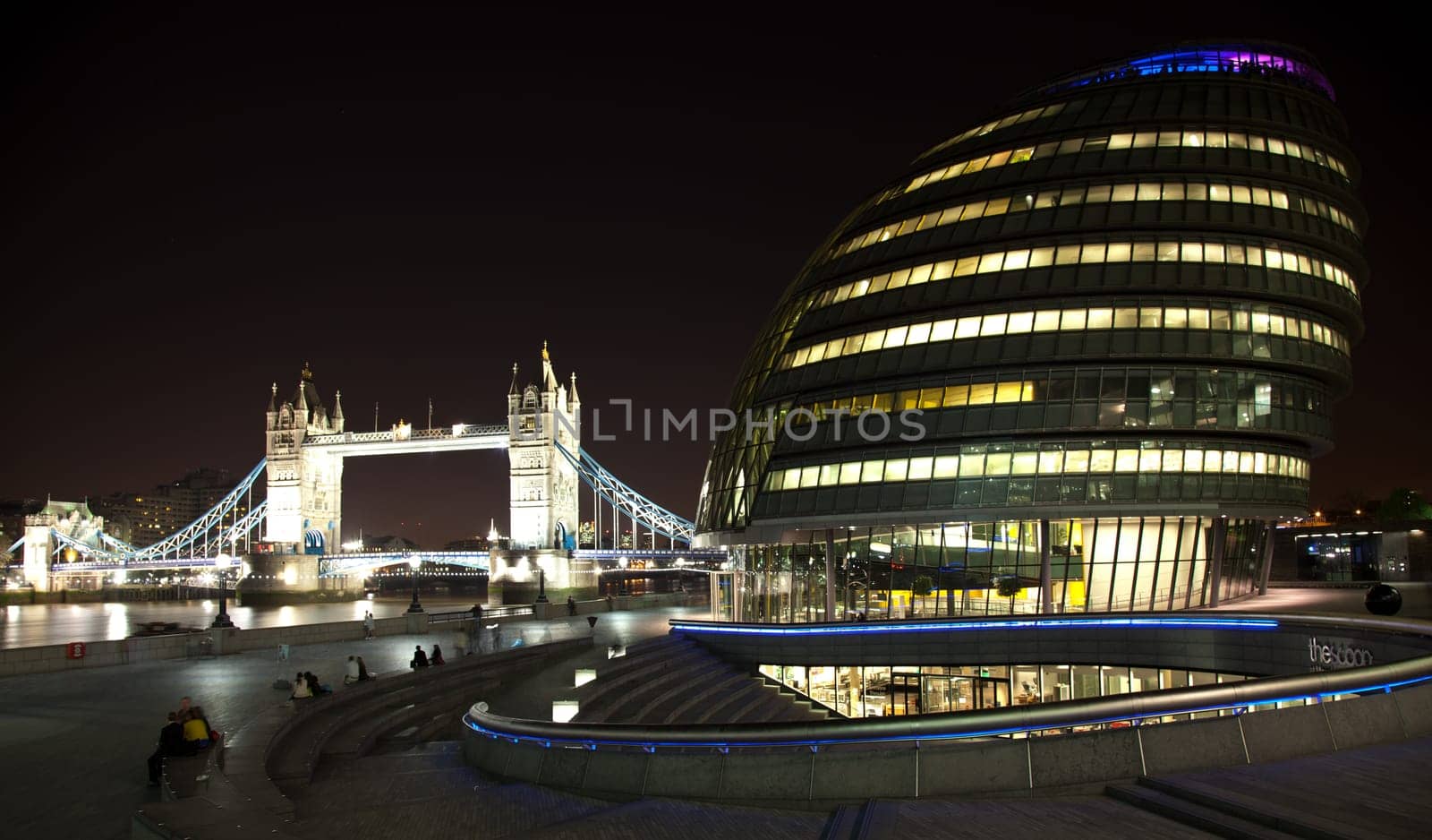 London Tower Bridge at night with plenty of lights
