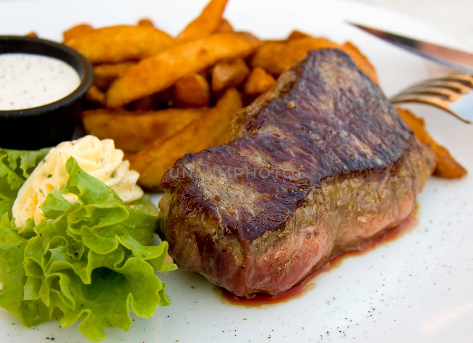 Steak with dip,potato wedges,butter