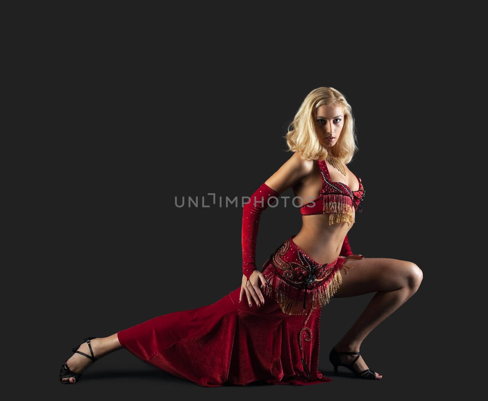 Beauty young dancer - red traditional arabian costume