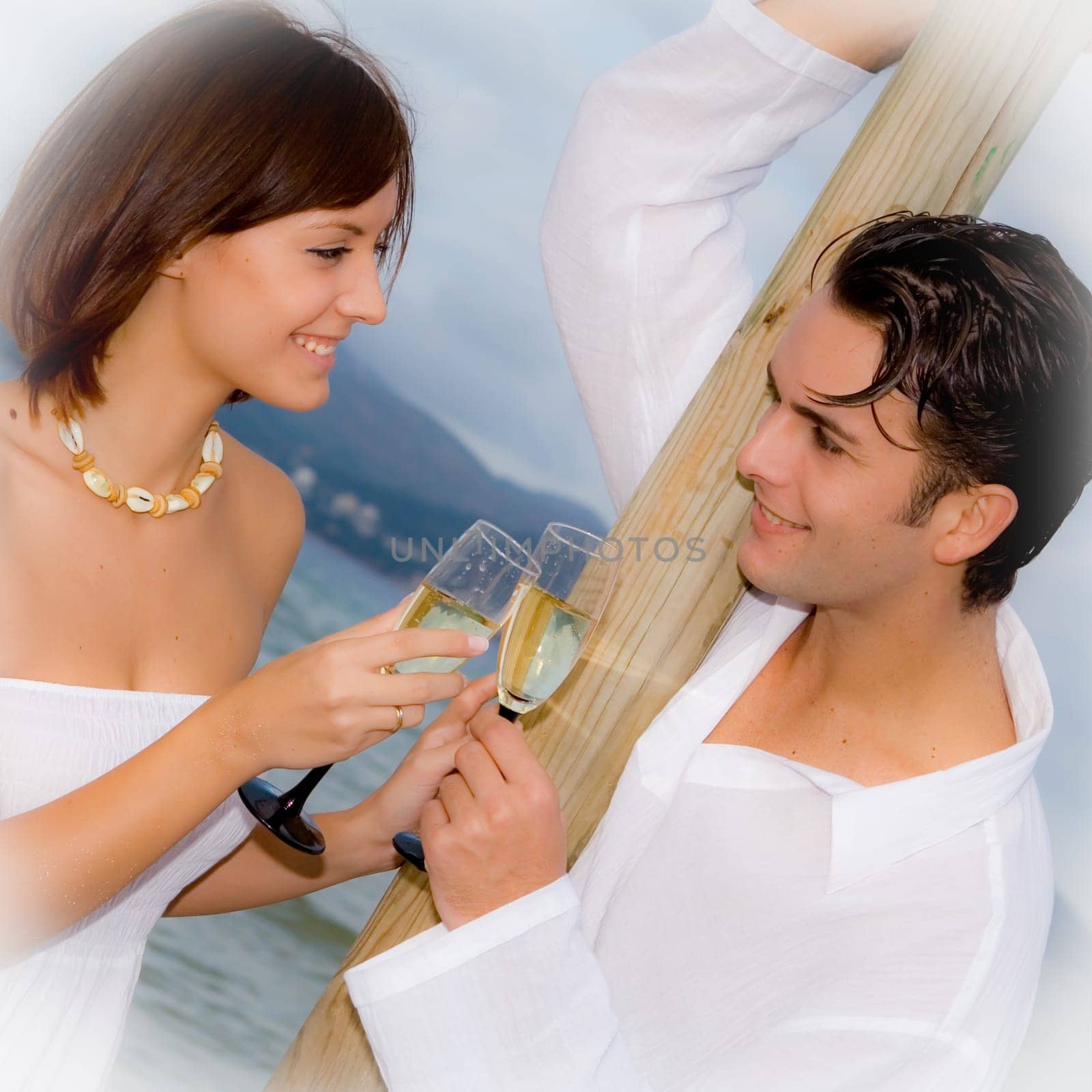 happy couple on vacation or honeymoon or engagement party