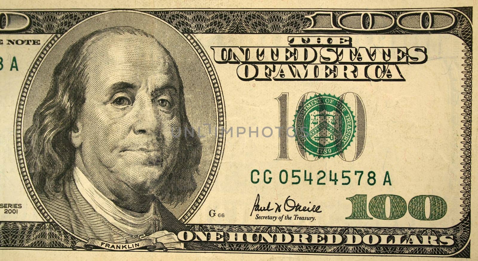 The Front half of a one hundred dollar bill