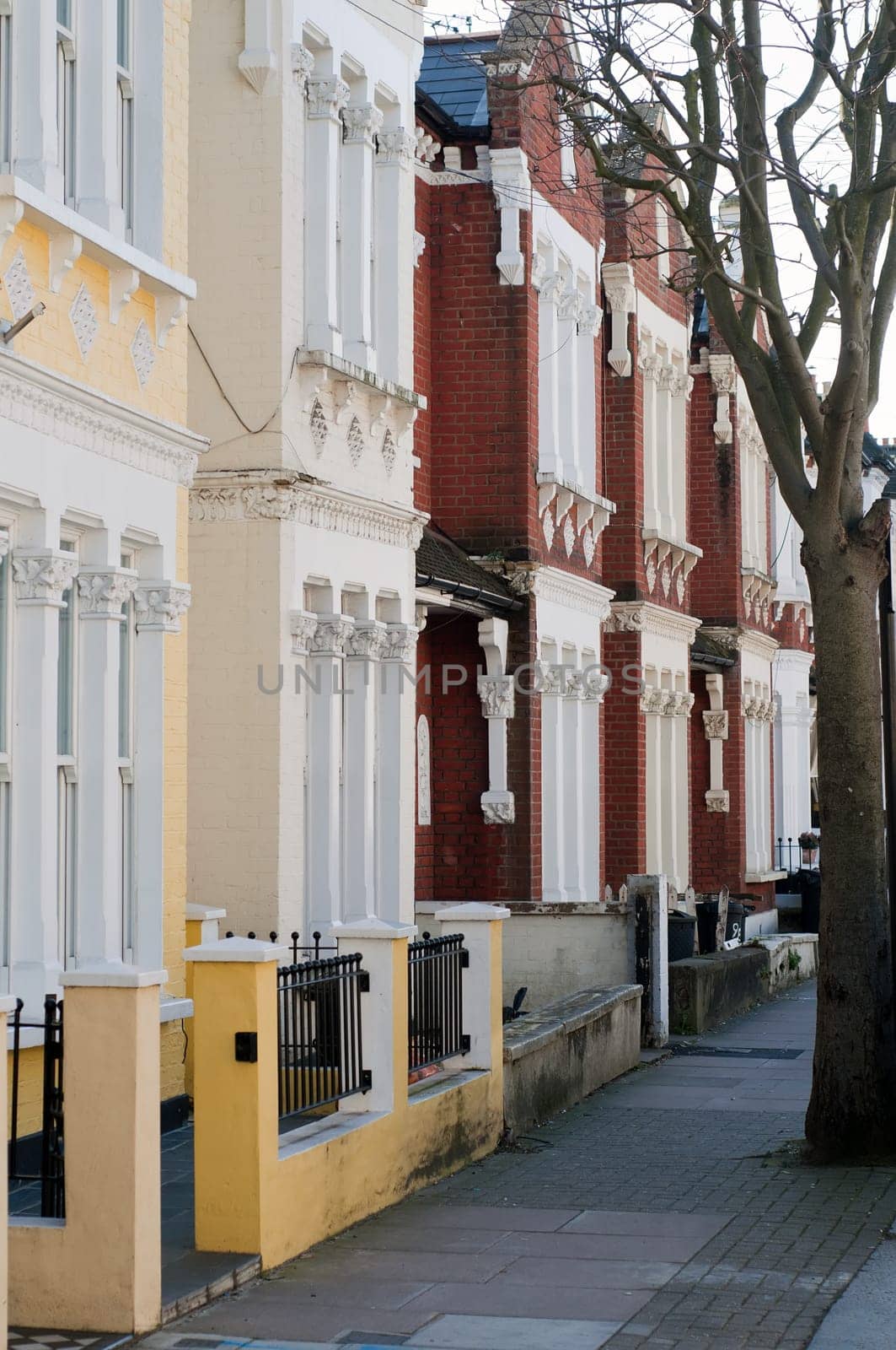 Typical traditional multicolored english buildings, outdoor shoot