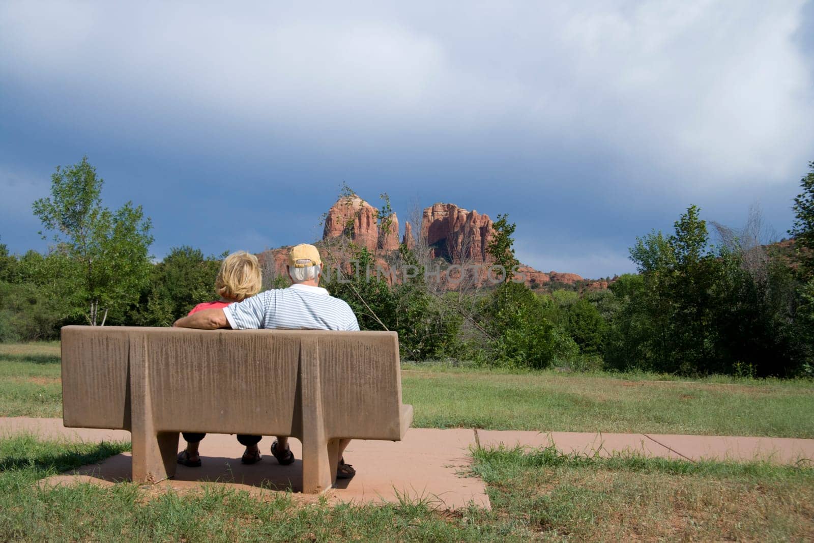 A senior couple enjoying the view of Cathedral Rock near Sedona, Arizona