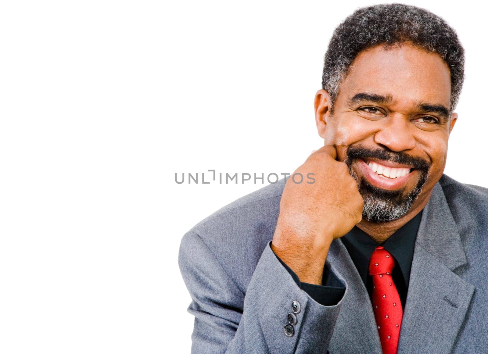 Businessman thinking and smiling isolated over white