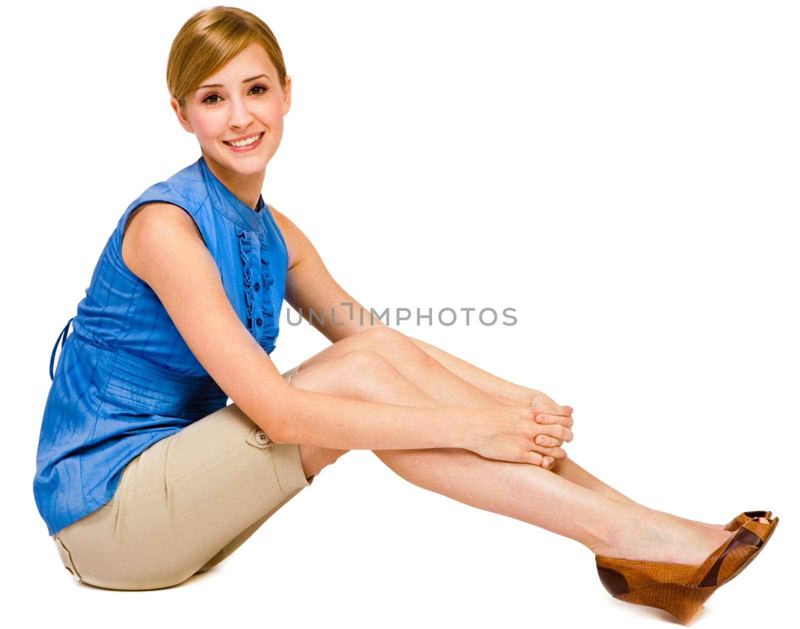 Confident woman posing and smiling isolated over white