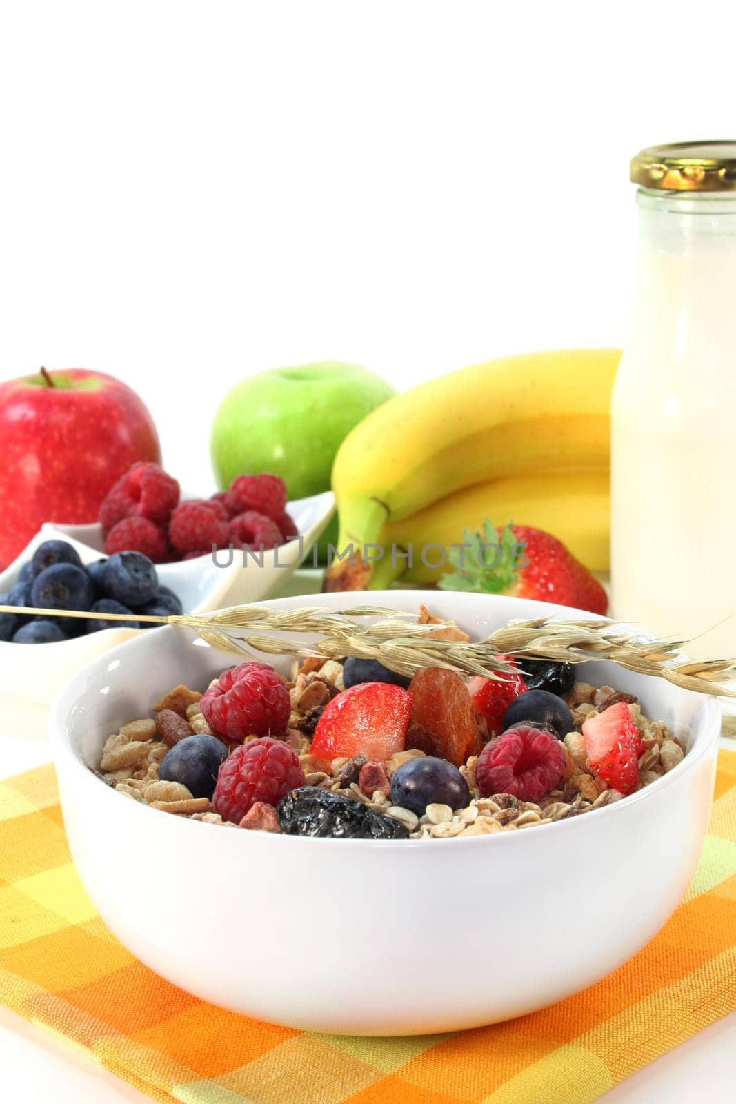 a bowl of fruit muesli with fresh berries