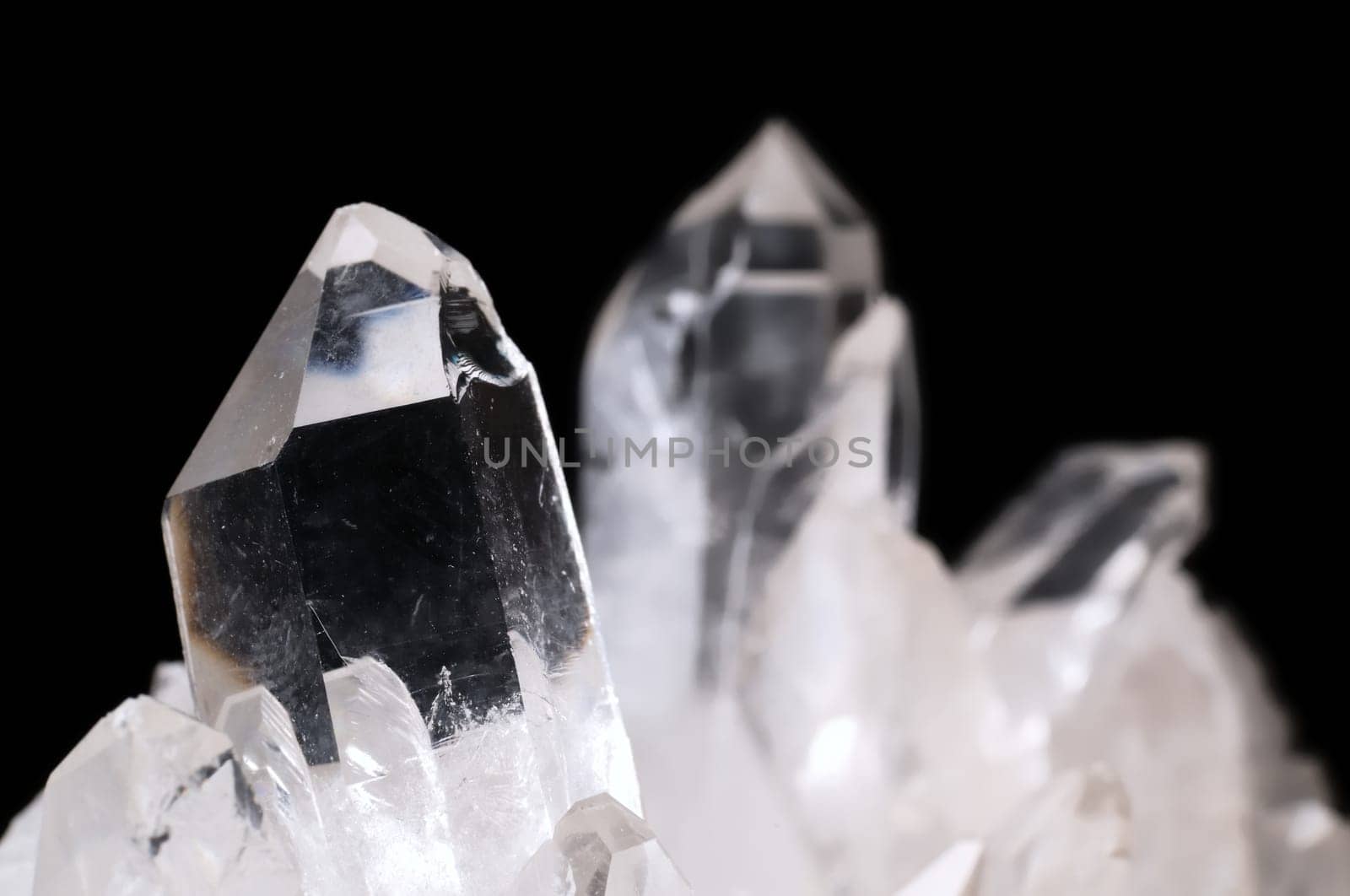 Quartz crystals on black background