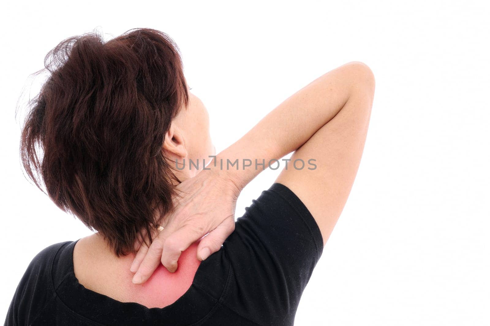 Mature woman with neck pain (marked red)