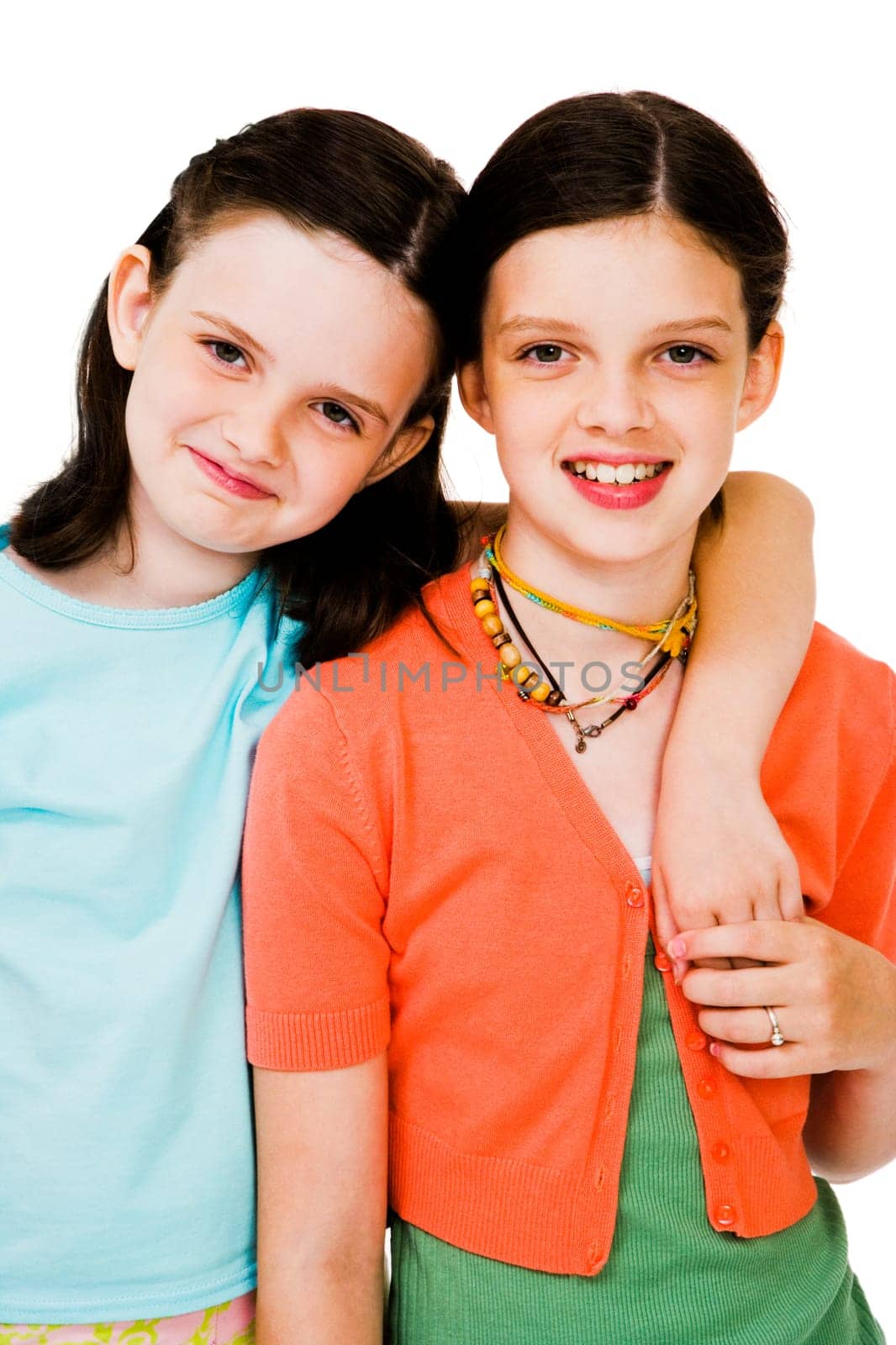 Portrait of girls posing and smiling isolated over white