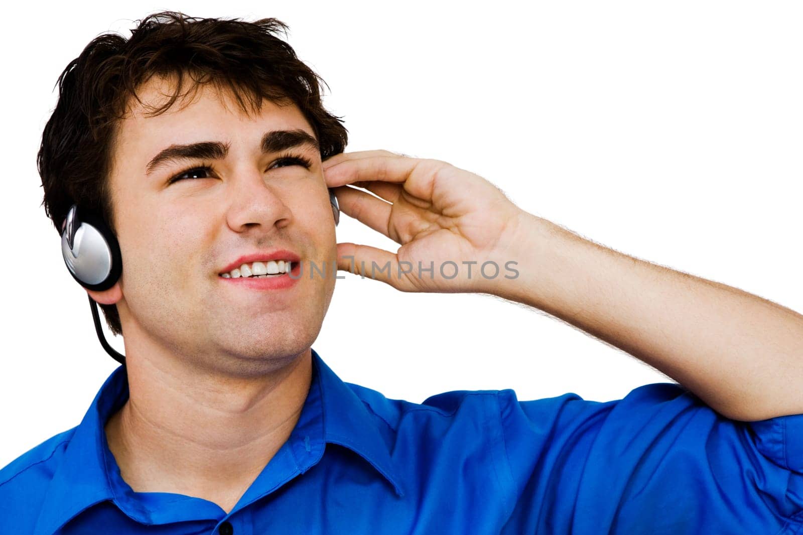 Close-up of a man listening to music on a headphones isolated over white