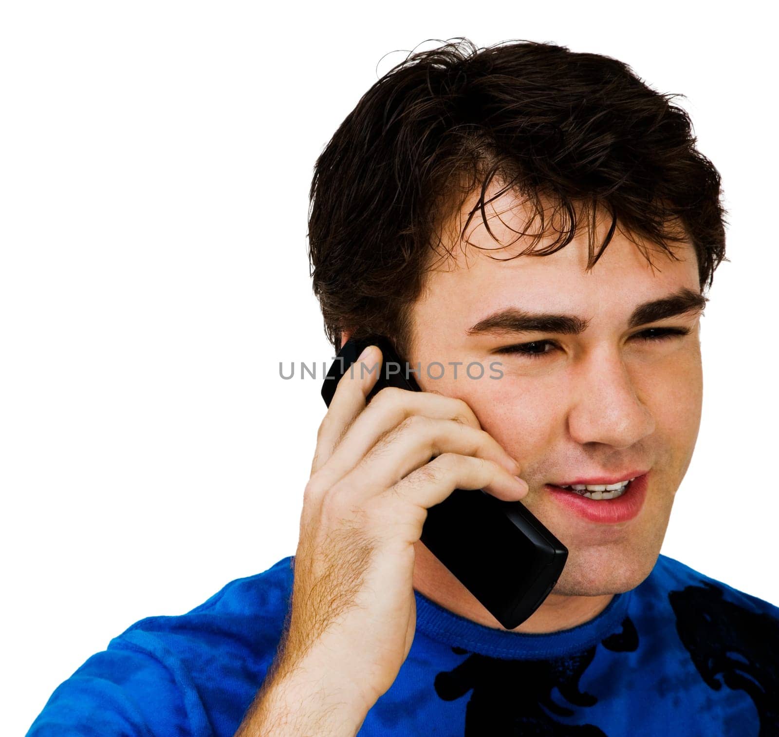 Smiling man talking on a mobile phone isolated over white