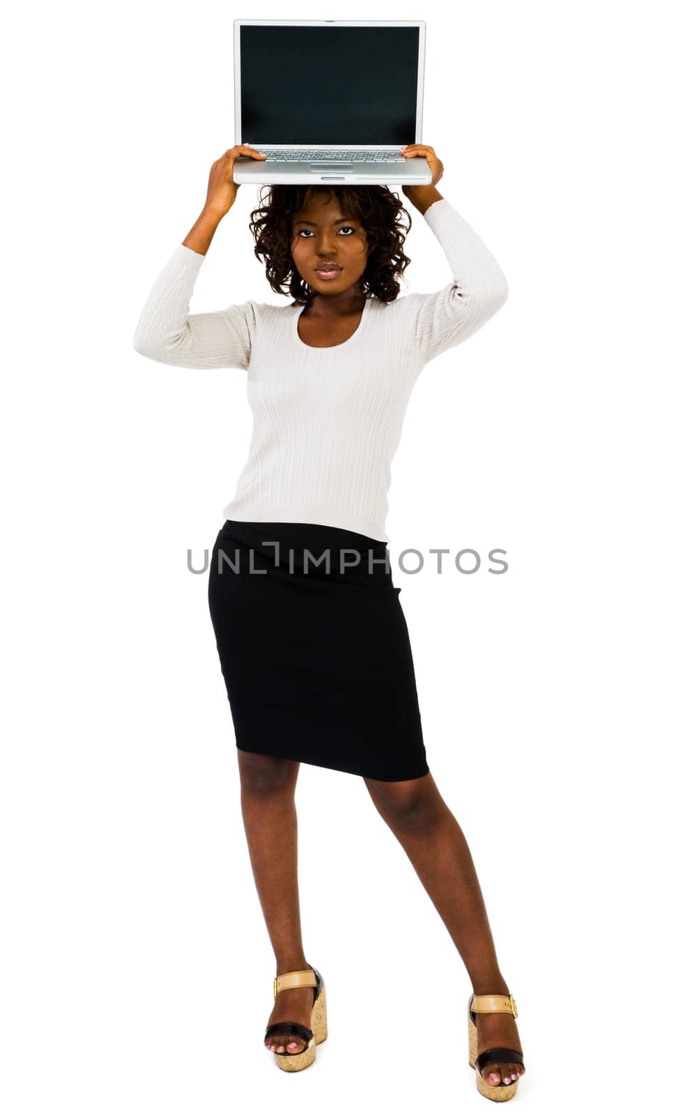Woman showing a laptop and posing isolated over white