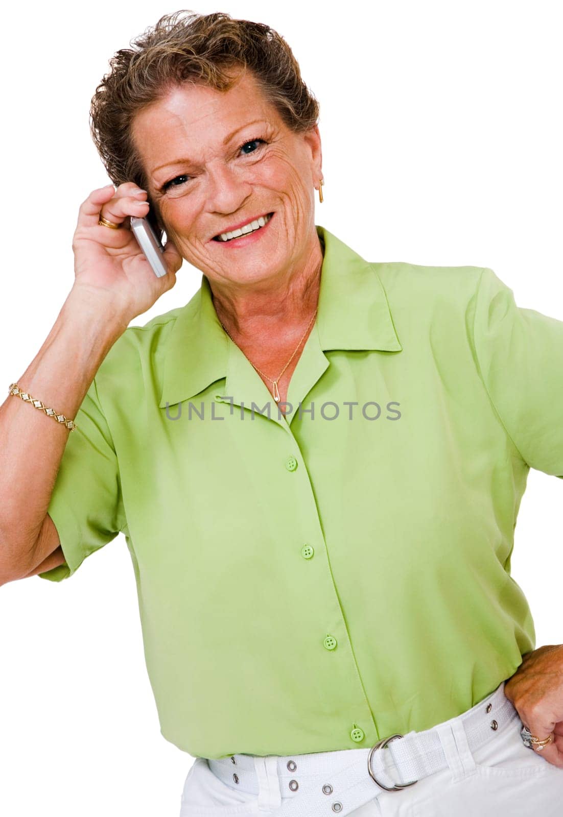 Confident woman talking on a mobile phone isolated over white