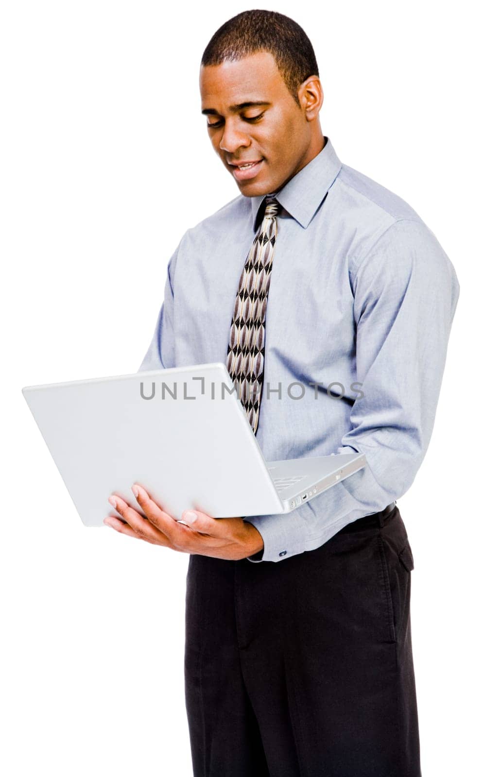 Businessman using a laptop and smiling isolated over white