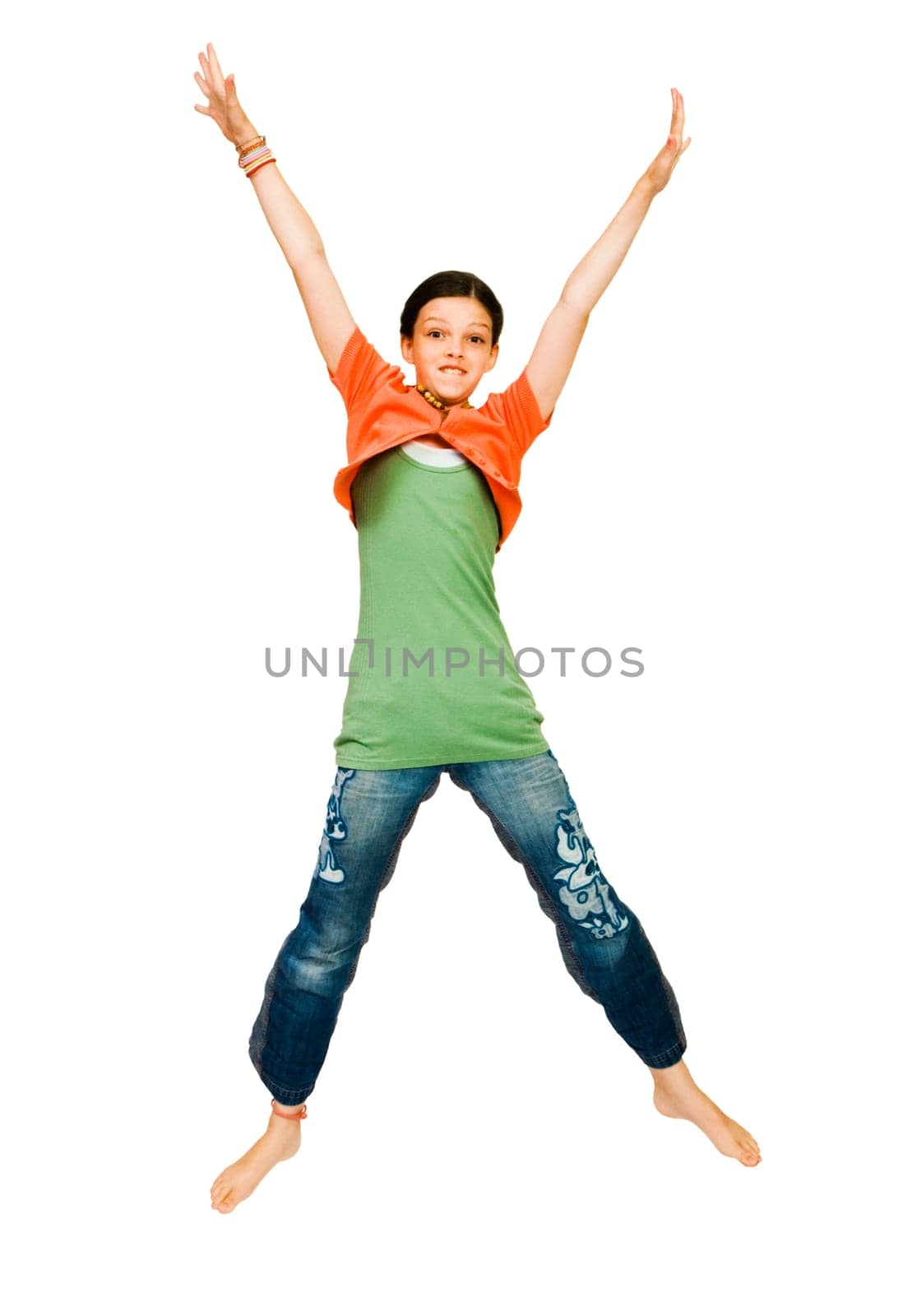 Smiling girl jumping and posing isolated over white
