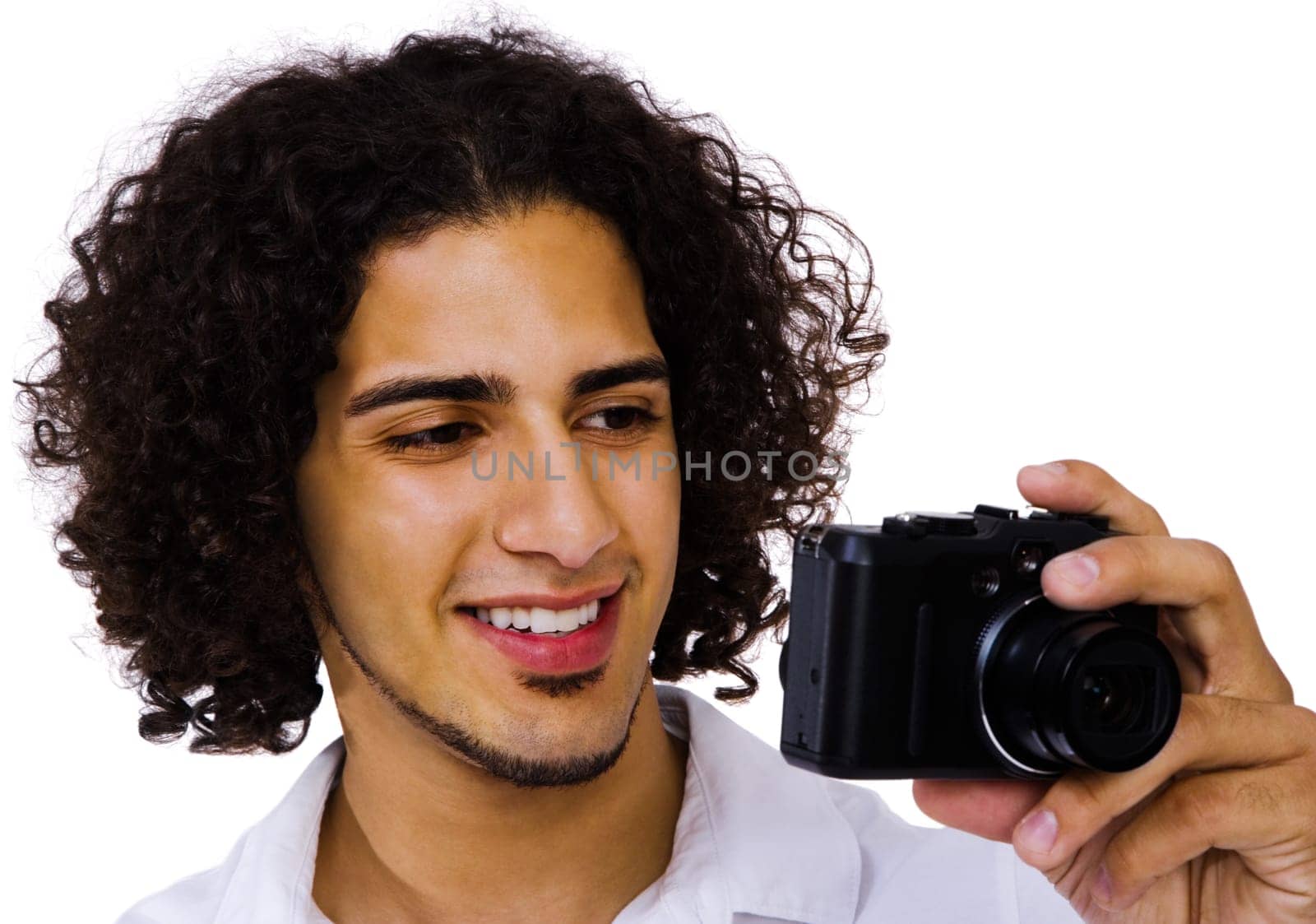Man photographing with a camera and smiling isolated over white