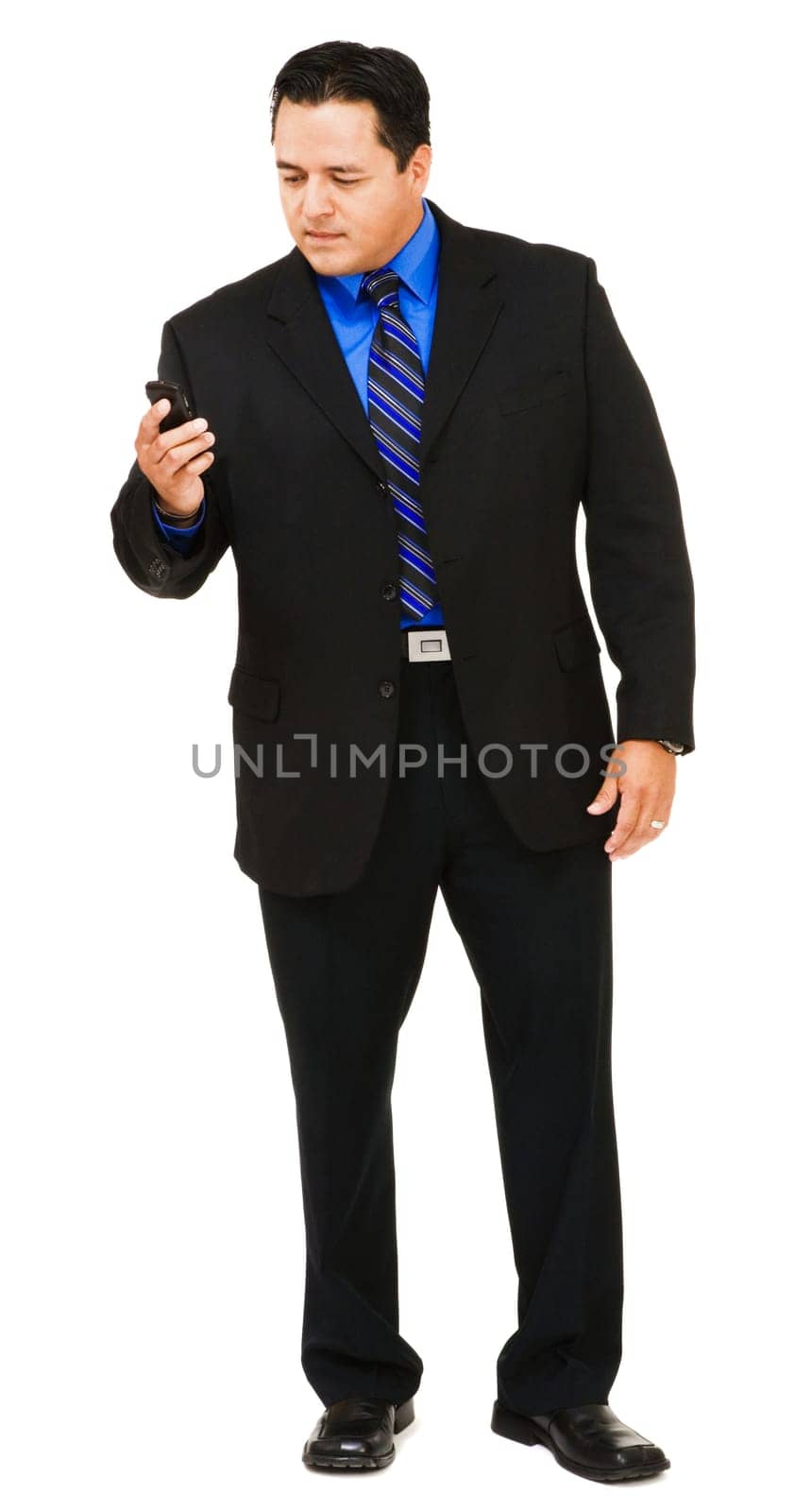 Businessman on the mobile phone isolated over white