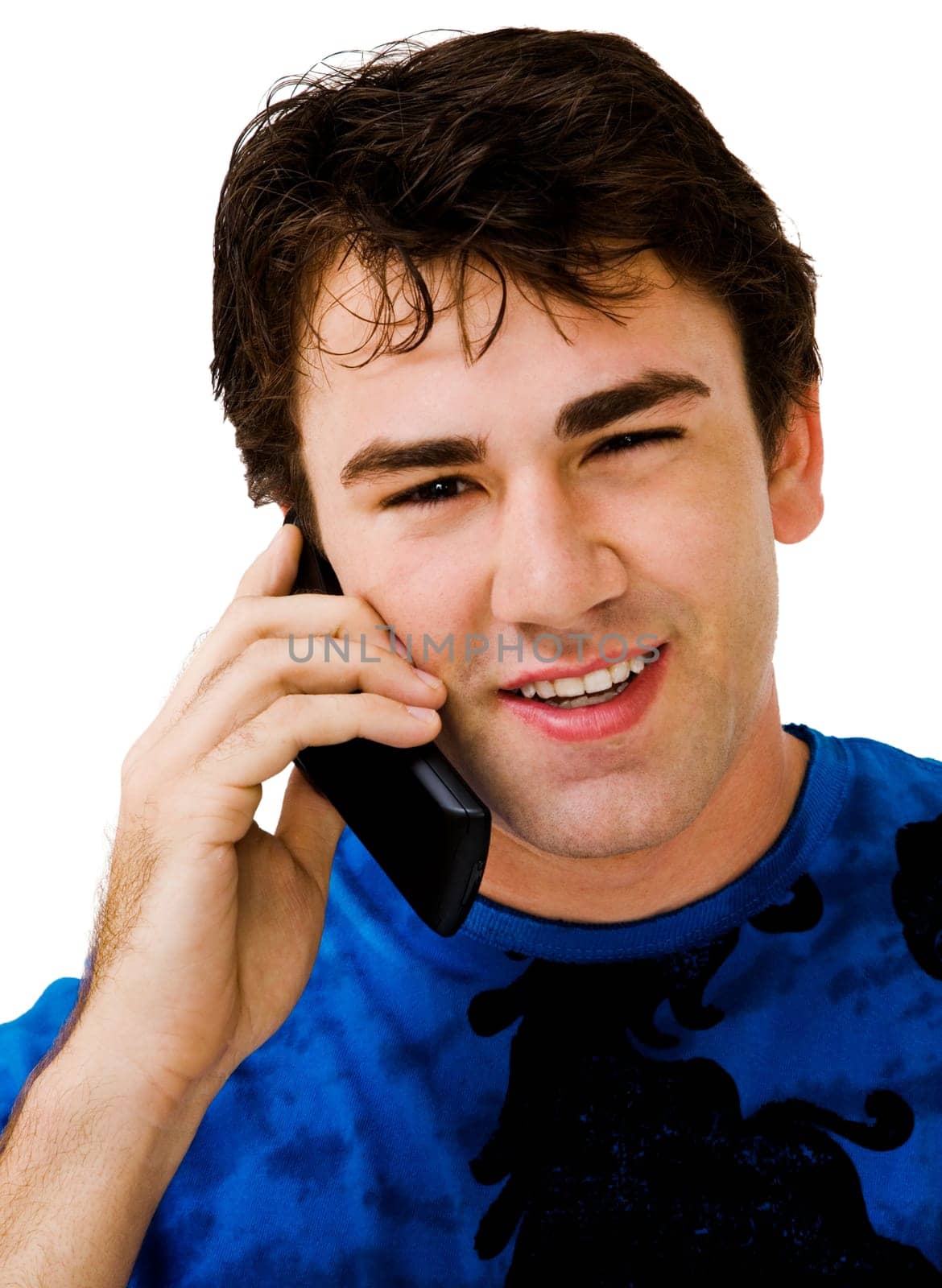 Happy man talking on a mobile phone isolated over white