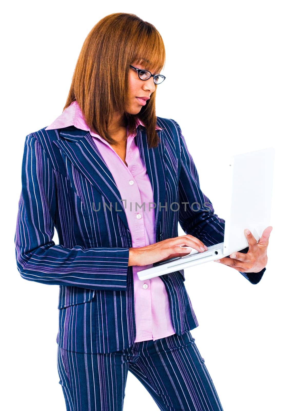 Businesswoman using a laptop isolated over white