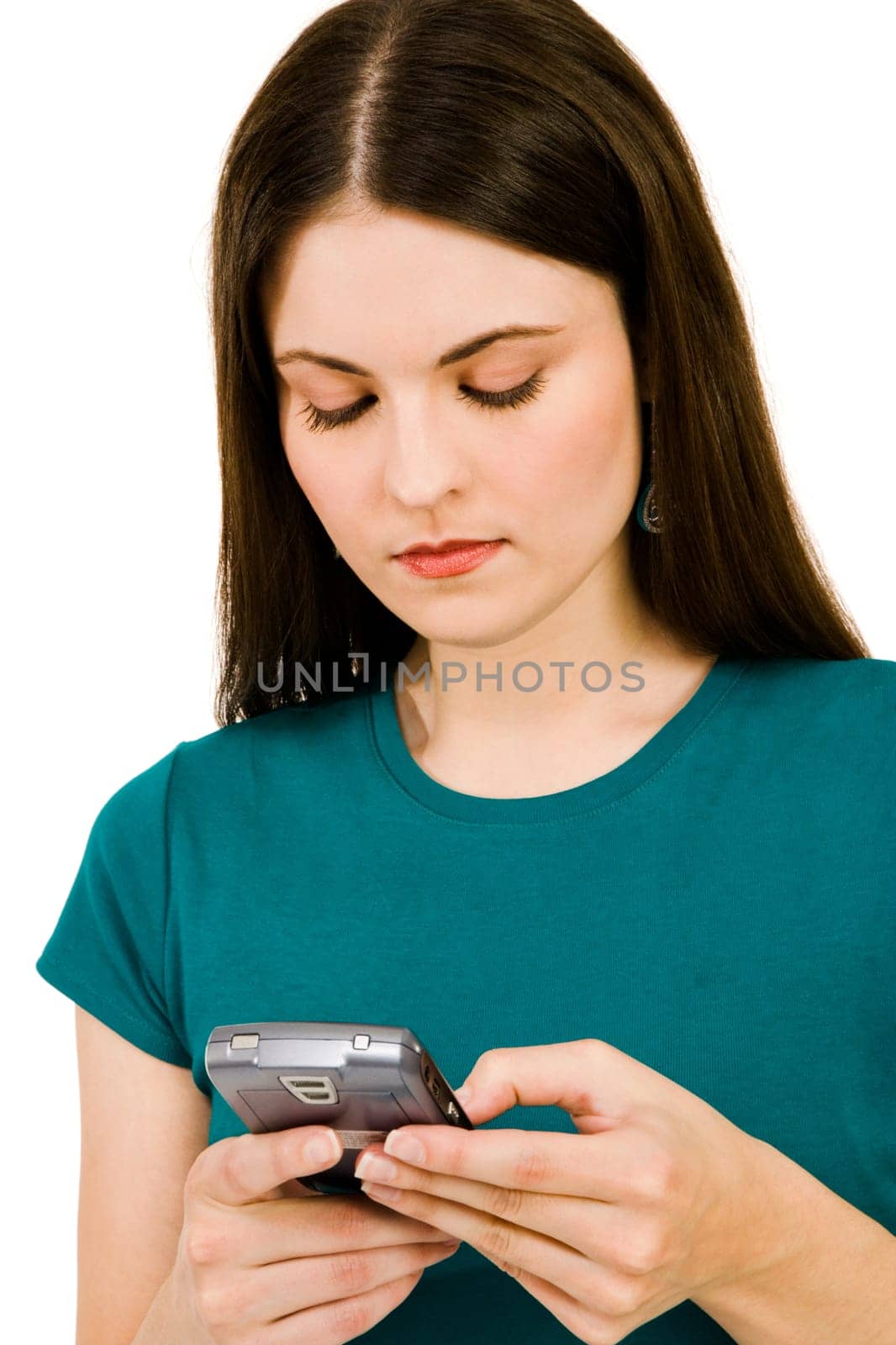Caucasian woman text messaging on a mobile phone isolated over white