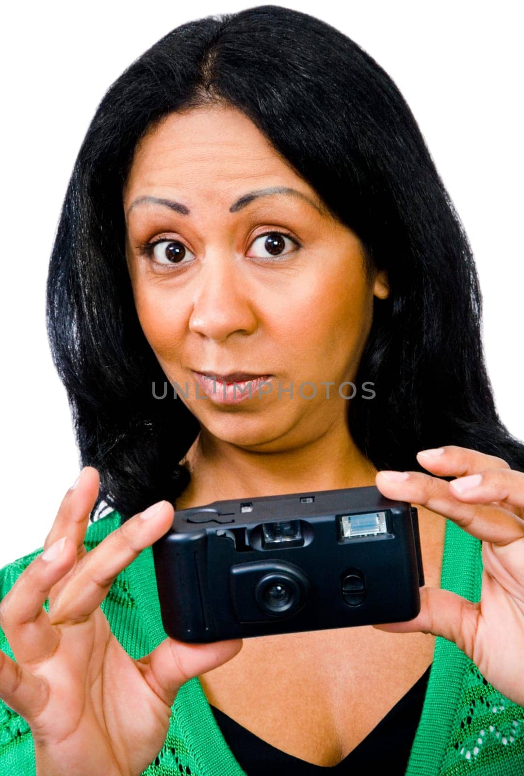 Mid adult woman photographing with a camera and looking surprised isolated over white