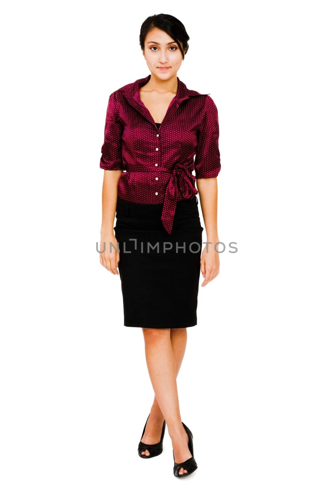 Young woman smiling and posing isolated over white