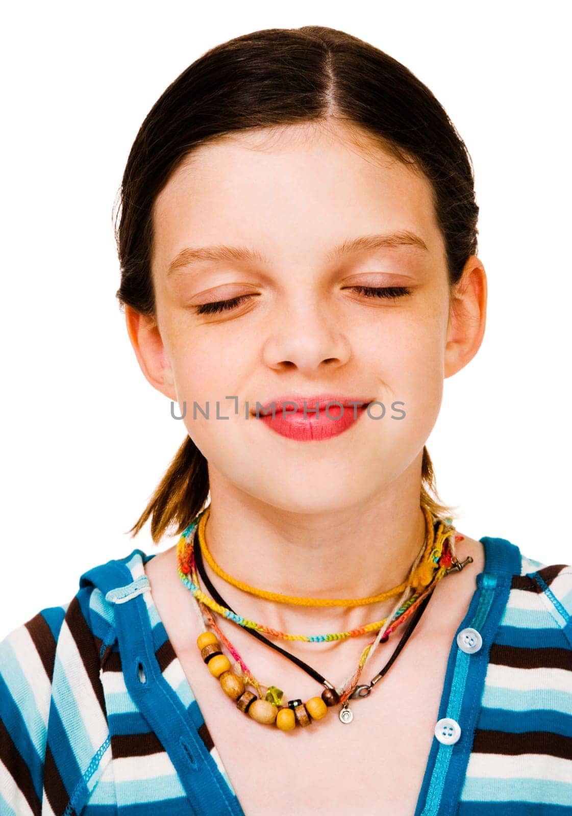 Cute girl day dreaming and smiling isolated over white