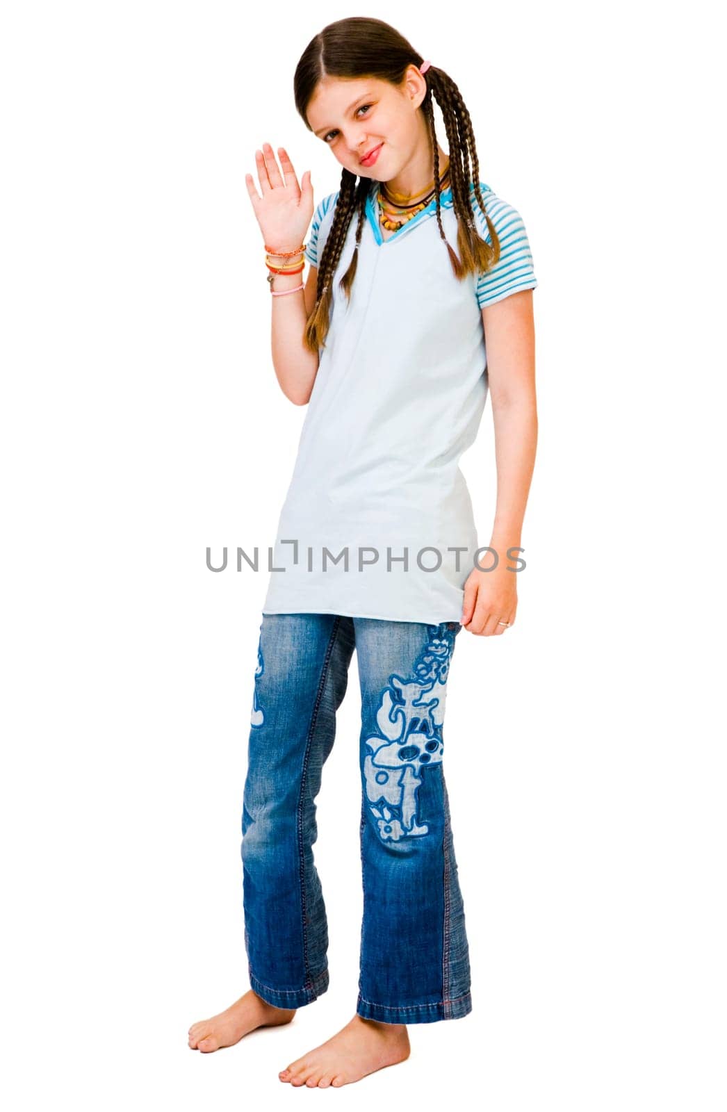 Child waving her hand and smiling isolated over white
