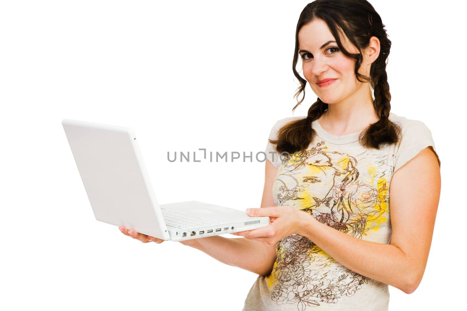 Caucasian young woman holding a laptop isolated over white