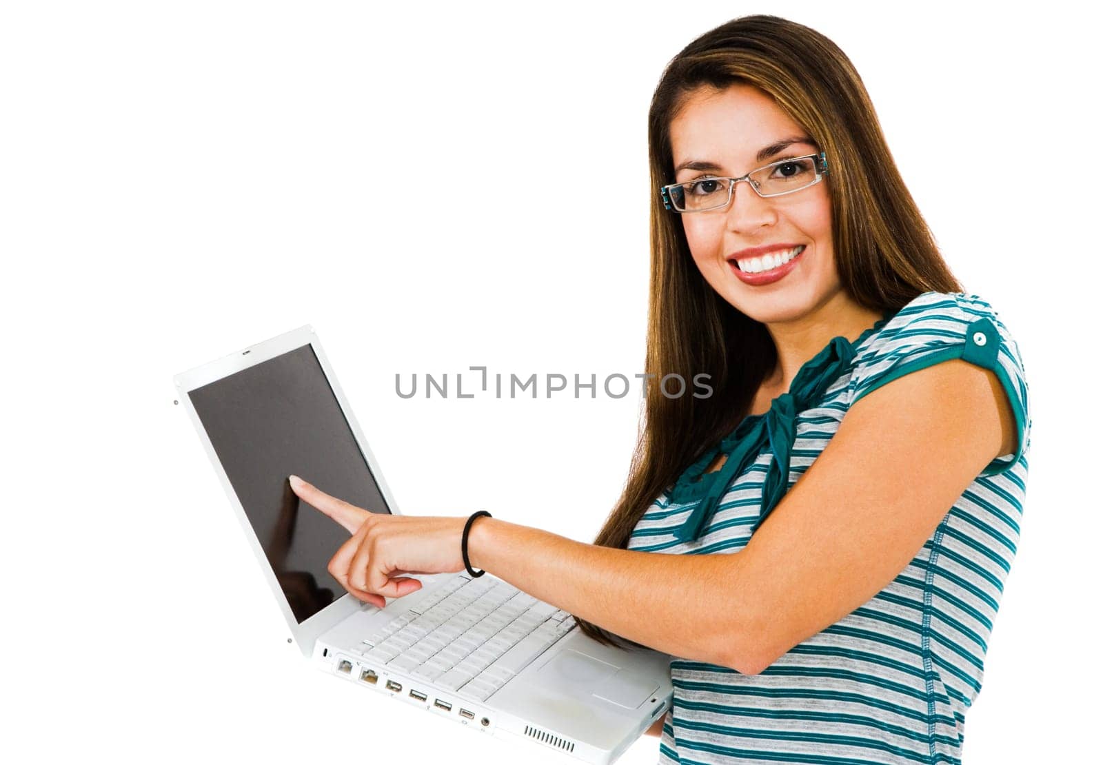 Mid adult woman using a laptop and smiling isolated over white