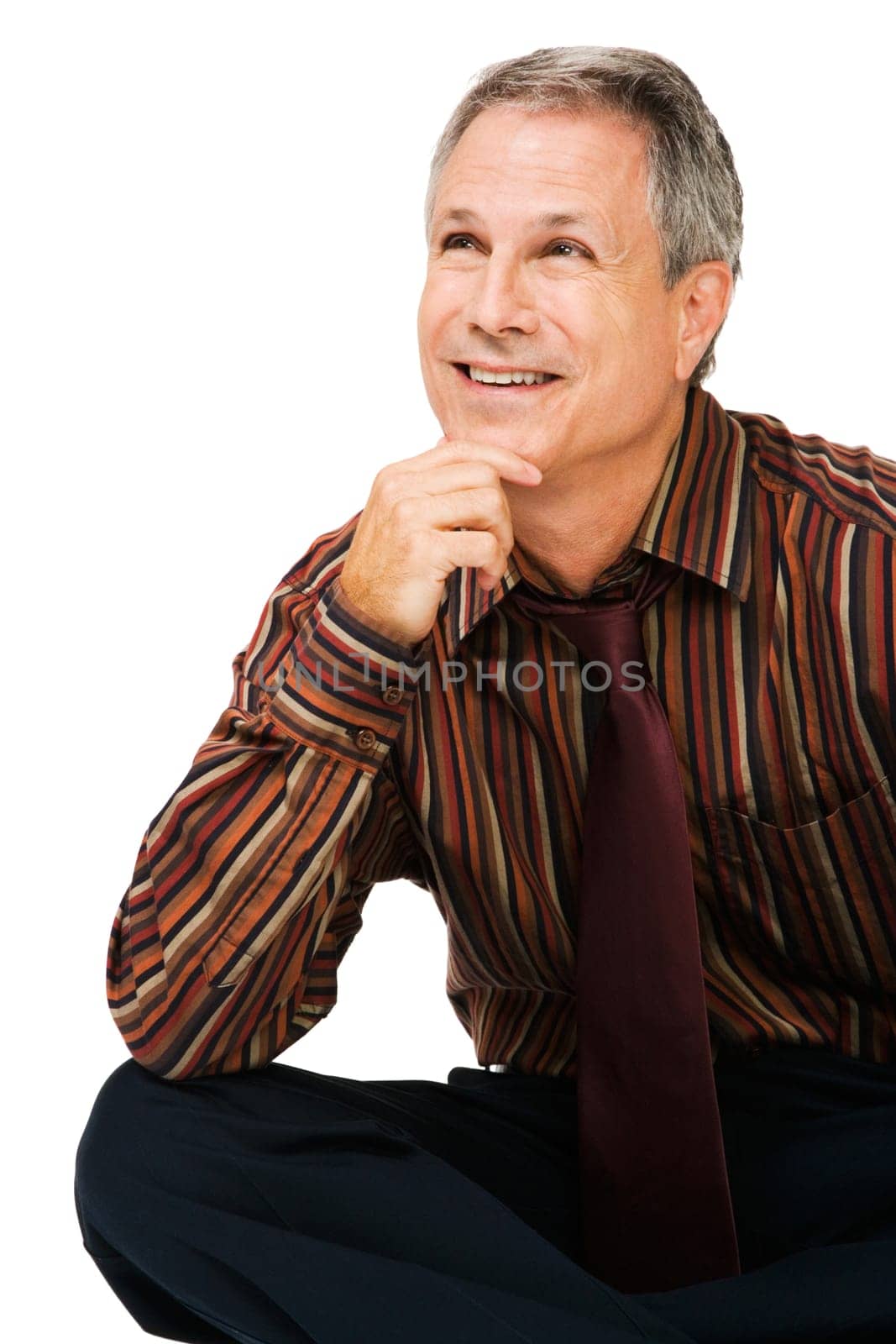 Businessman day dreaming and smiling isolated over white
