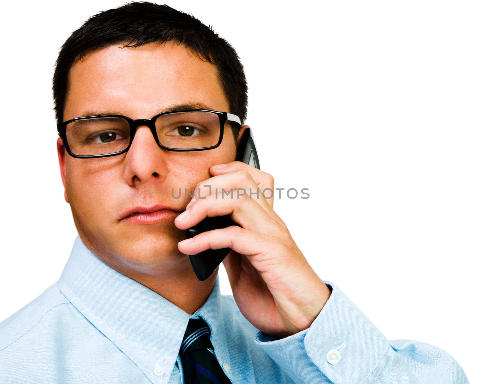 Portrait of a businessman talking on a mobile phone isolated over white