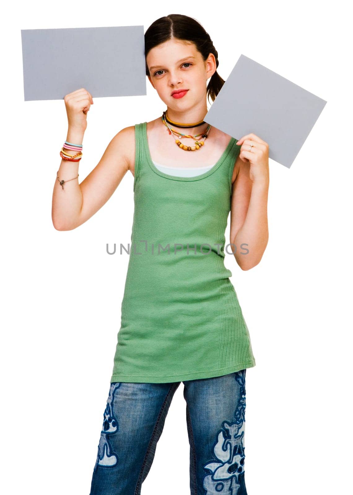 Smiling girl showing placards and posing isolated over white