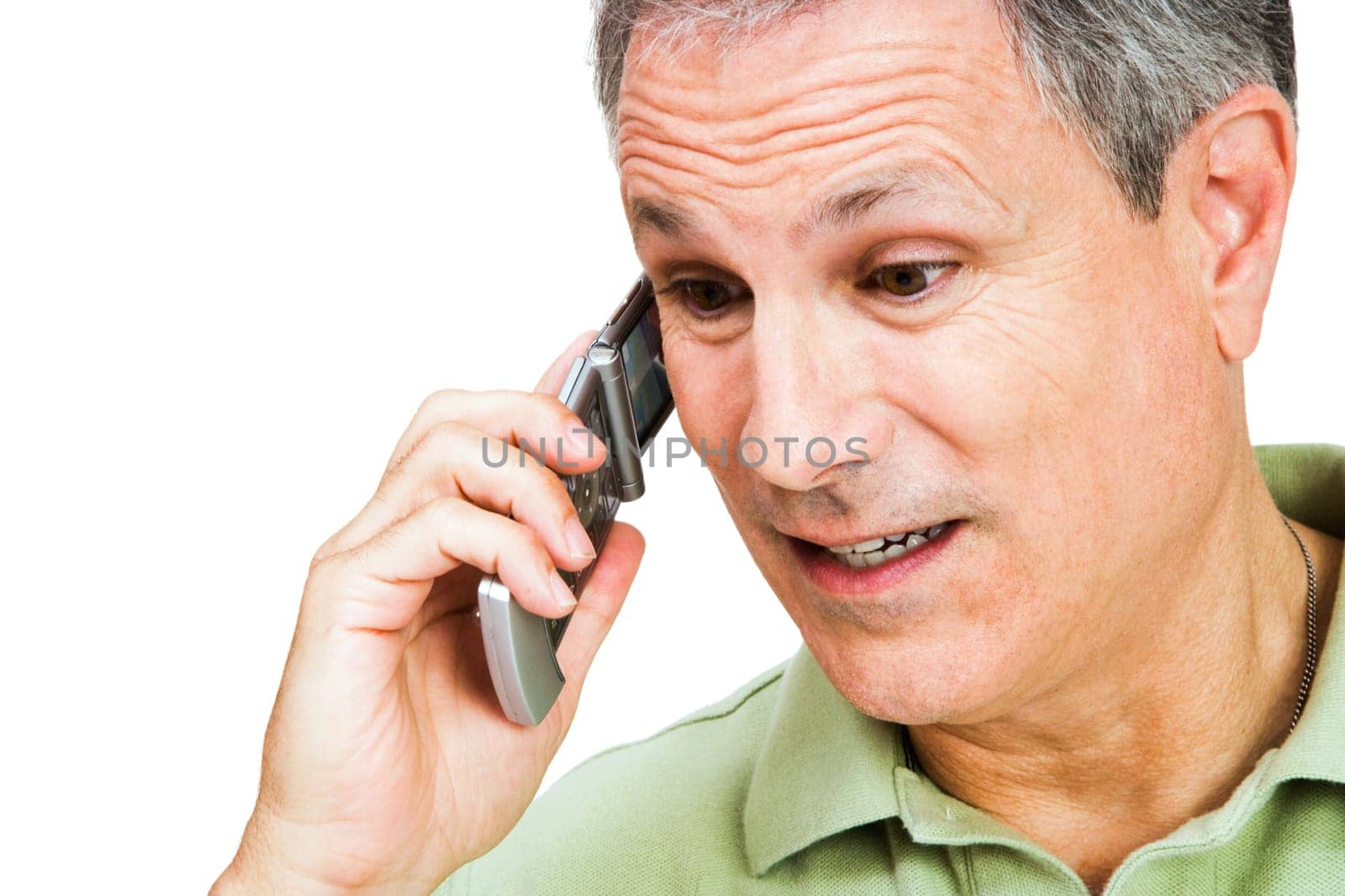 Close-up of a man talking on a mobile phone isolated over white