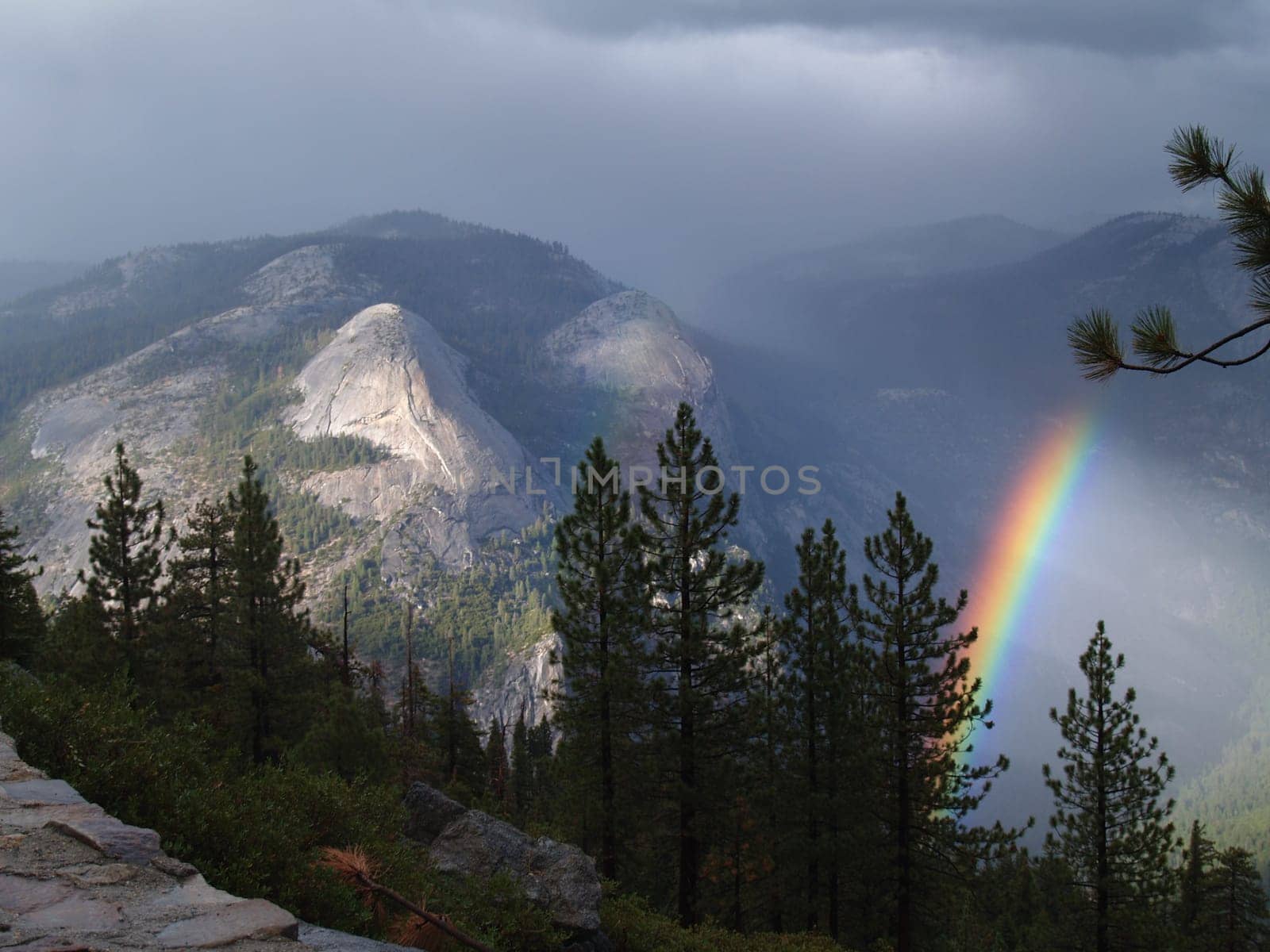 A rainbow in the fog in Yosemite National Park, California.