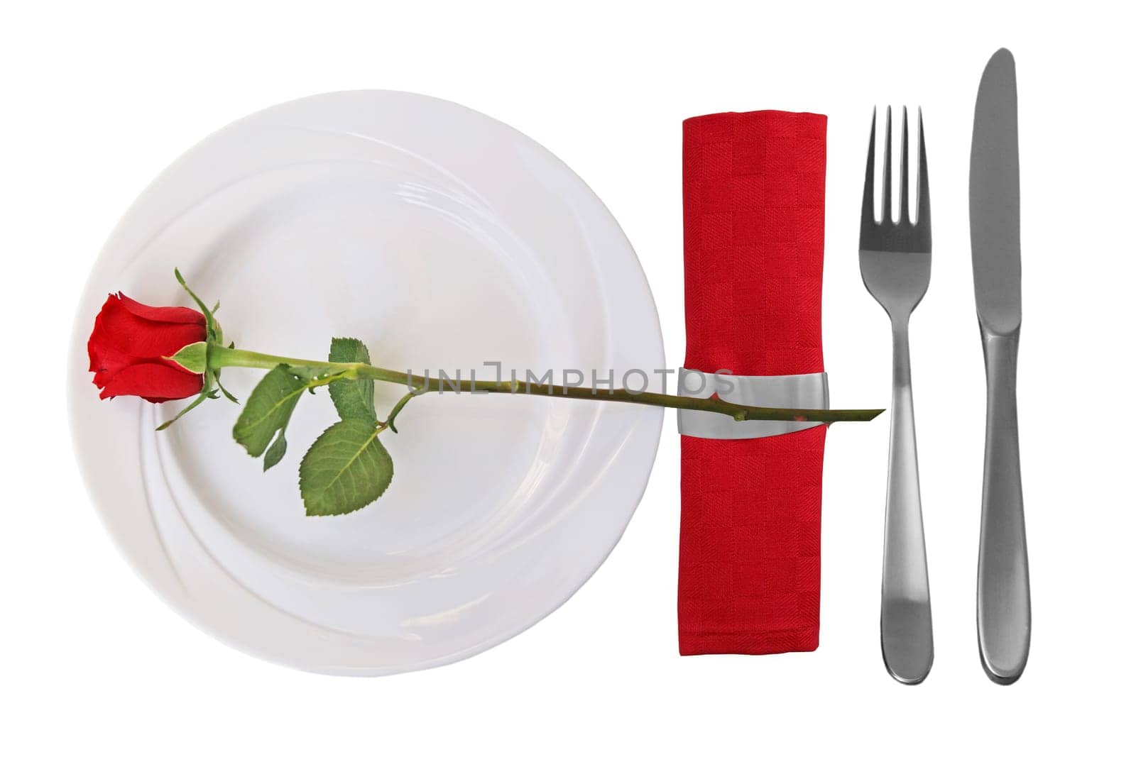 Place setting on whtie plate and red rose on white Background