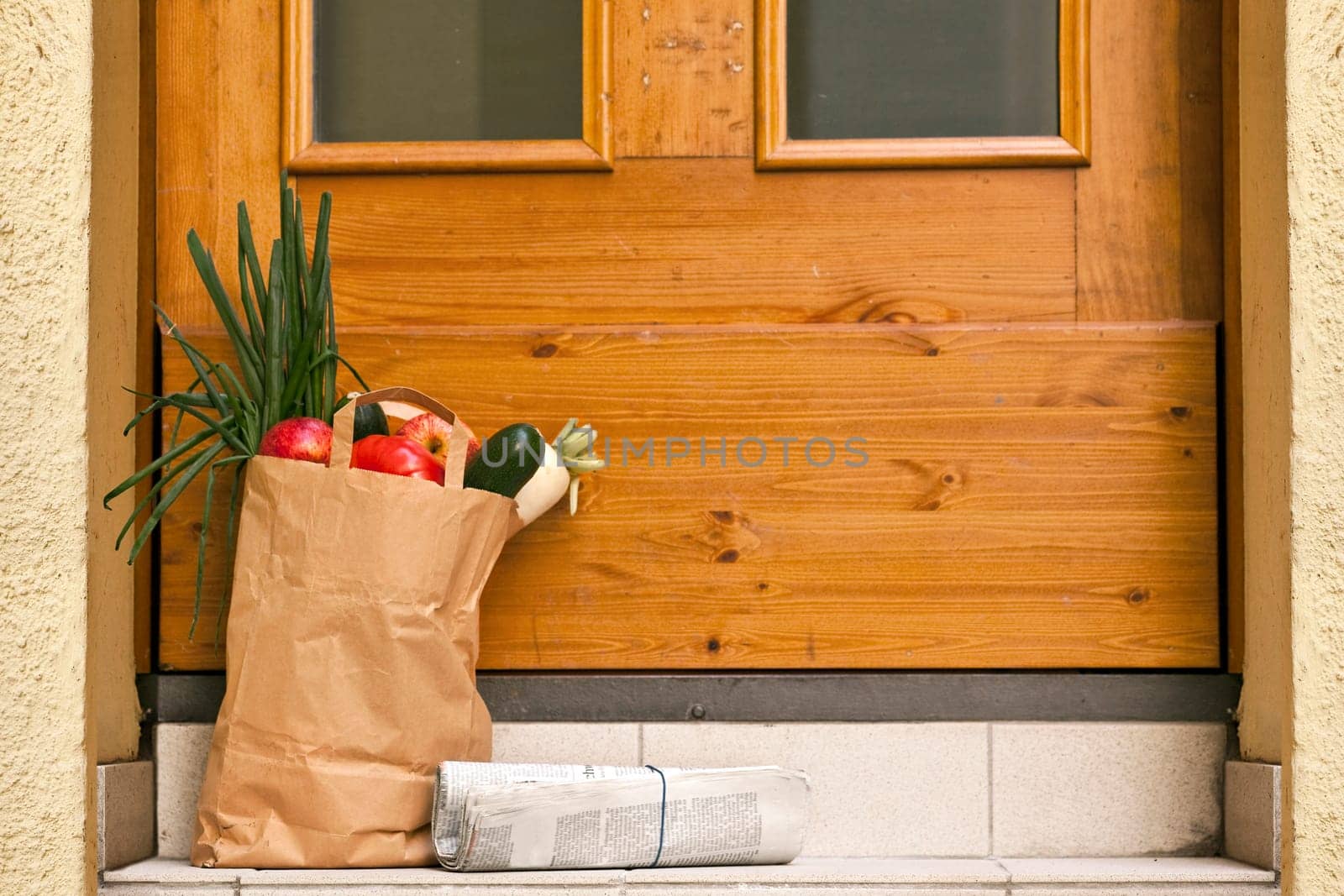 delivery service- Grocery bag and Newspaper at the doorstep