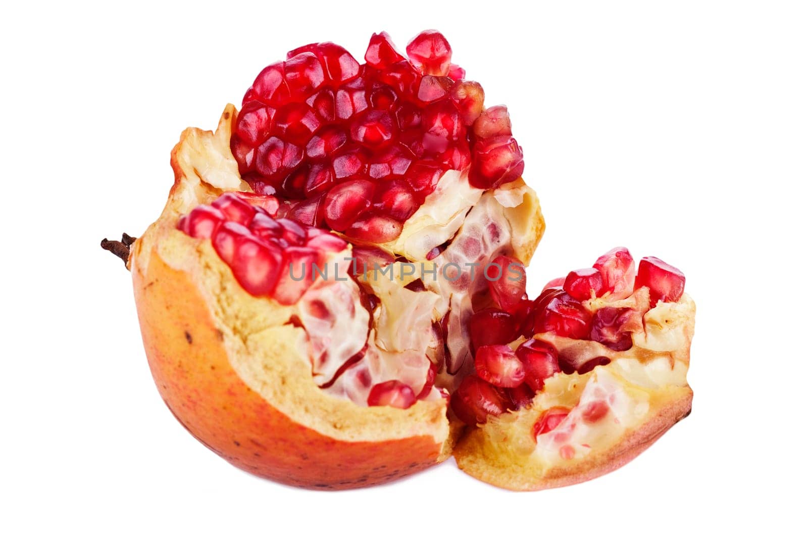 ripe, and fresh half and full pomegranate isolated on white